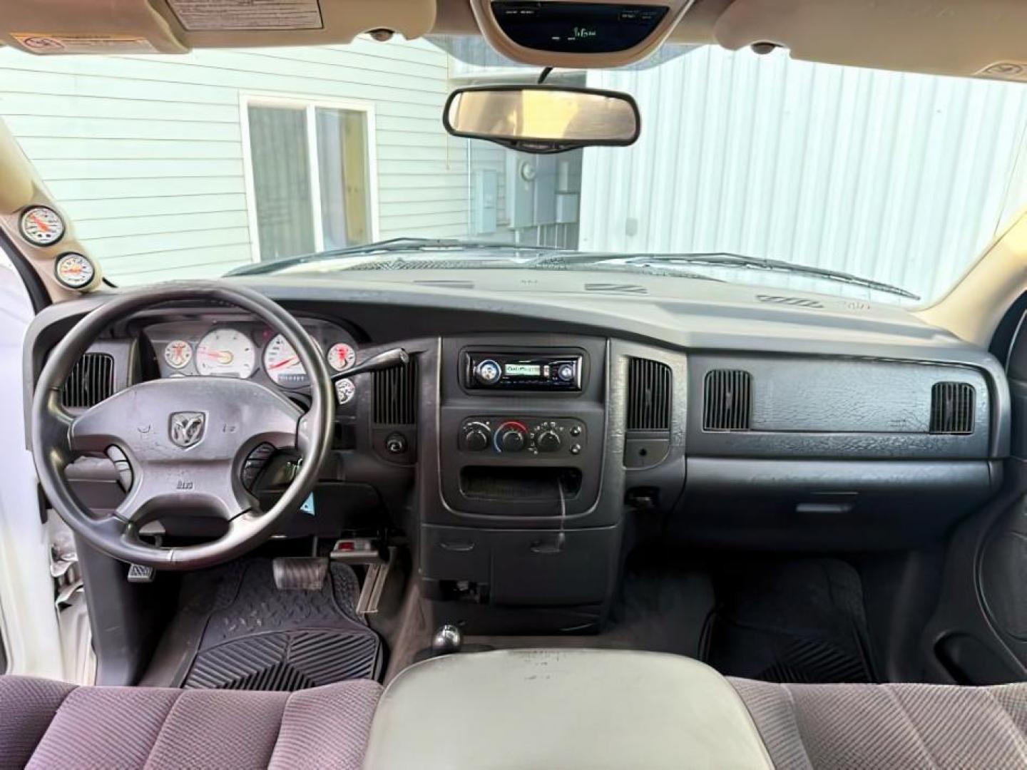 2003 WHITE /Dark Slate Gray Dodge Ram 3500 (3D7LU38653G) with an Cummins 59L I-6 diesel direct injection engine, Automatic transmission, located at 1175 N Woodruff Ave, Idaho Falls, ID, 83401, 43.506901, -111.999657 - At Timberline Auto, finding a great deal on your next vehicle is always easy! Our experienced sales staff's goal is to help find you the right vehicle at the right price! Our knowledgeable finance department has options for almost any credit score. We offer extended service contract options to prote - Photo#18