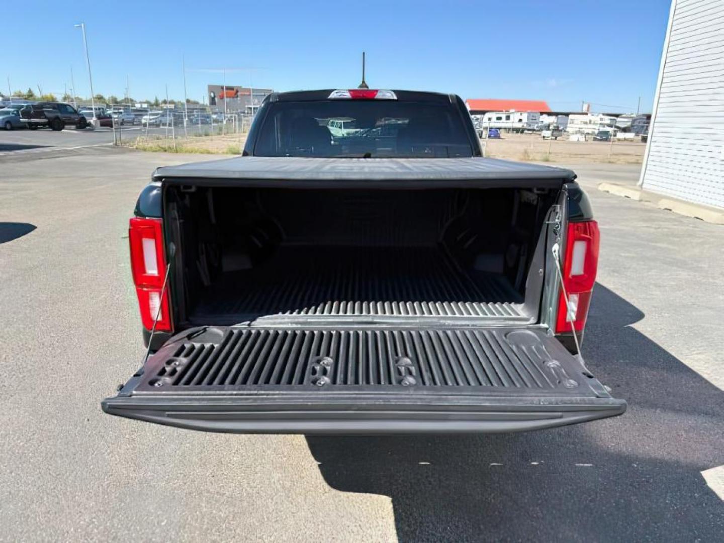 2020 Shadow Black /Ebony Ford Ranger (1FTER4FH3LL) with an EcoBoost 23L I-4 gasoline direct injection engine, Automatic transmission, located at 1175 N Woodruff Ave, Idaho Falls, ID, 83401, 43.506901, -111.999657 - At Timberline Auto, finding a great deal on your next vehicle is always easy! Our experienced sales staff's goal is to help find you the right vehicle at the right price! Our knowledgeable finance department has options for almost any credit score. We offer extended service contract options to prote - Photo#5
