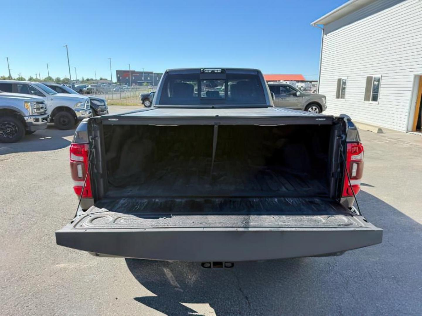 2021 GRAY /Black Ram 3500 (3C63R3JL8MG) with an Cummins High Output 67L I-6 diesel direct injecti engine, Automatic transmission, located at 1175 N Woodruff Ave, Idaho Falls, ID, 83401, 43.506901, -111.999657 - At Timberline Auto, finding a great deal on your next vehicle is always easy! Our experienced sales staff's goal is to help find you the right vehicle at the right price! Our knowledgeable finance department has options for almost any credit score. We offer extended service contract options to prote - Photo#5