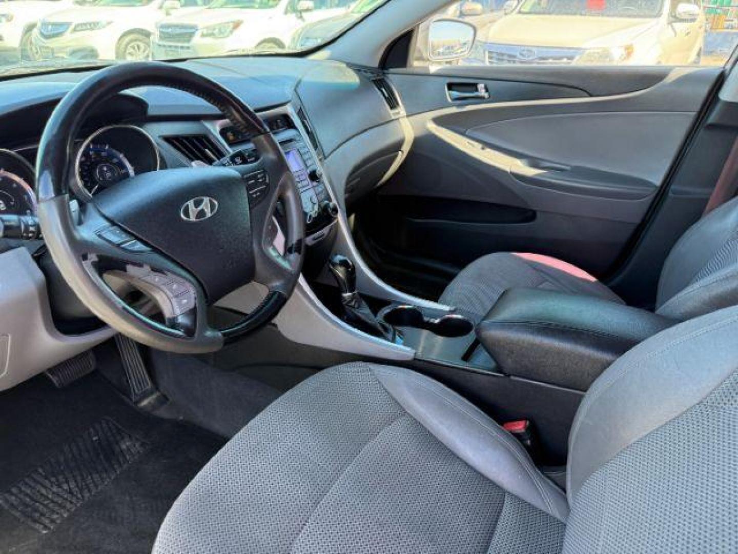 2012 SILVER /Black Hyundai Sonata (5NPEC4AC2CH) with an 24L I-4 gasoline direct injection engine, Automatic transmission, located at 1175 N Woodruff Ave, Idaho Falls, ID, 83401, 43.506901, -111.999657 - At Timberline Auto, finding a great deal on your next vehicle is always easy! Our experienced sales staff's goal is to help find you the right vehicle at the right price! Our knowledgeable finance department has options for almost any credit score. We offer extended service contract options to prote - Photo#7