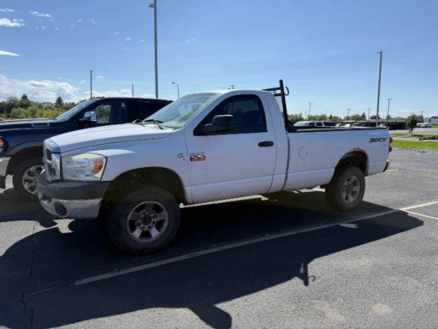 2009 WHITE /CLOTH Dodge Ram 2500 SXT (3D7KS26L49G) with an 6.7L engine, AUTOMATIC transmission, located at 1235 N Woodruff Ave., Idaho Falls, 83401, (208) 523-1053, 43.507172, -112.000488 - At Timberline Auto, finding a great deal on your next vehicle is always easy! Our experienced sales staff's goal is to help find you the right vehicle at the right price! Our knowledgeable finance department has options for almost any credit score. We offer extended service contract options to prote - Photo#0