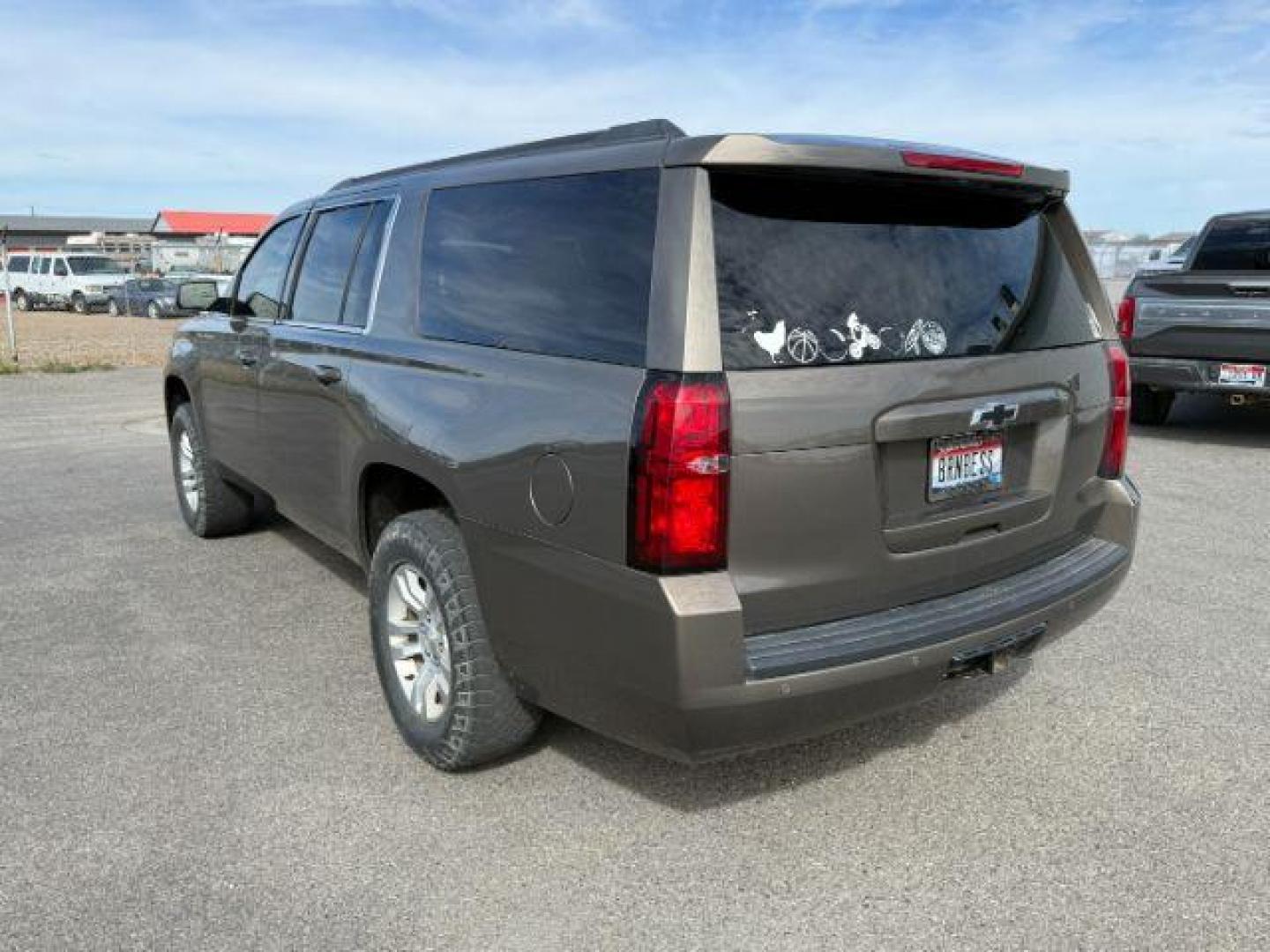 2015 BROWN /Cocoa/Dune Chevrolet Suburban 1500 (1GNSKJKC6FR) with an EcoTec3 53L V-8 gasoline direct injection engine, Automatic transmission, located at 1175 N Woodruff Ave, Idaho Falls, ID, 83401, 43.506901, -111.999657 - At Timberline Auto, finding a great deal on your next vehicle is always easy! Our experienced sales staff's goal is to help find you the right vehicle at the right price! Our knowledgeable finance department has options for almost any credit score. We offer extended service contract options to prote - Photo#2