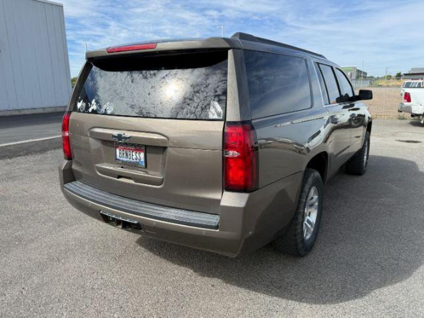 2015 BROWN /Cocoa/Dune Chevrolet Suburban 1500 (1GNSKJKC6FR) with an EcoTec3 53L V-8 gasoline direct injection engine, Automatic transmission, located at 1175 N Woodruff Ave, Idaho Falls, ID, 83401, 43.506901, -111.999657 - At Timberline Auto, finding a great deal on your next vehicle is always easy! Our experienced sales staff's goal is to help find you the right vehicle at the right price! Our knowledgeable finance department has options for almost any credit score. We offer extended service contract options to prote - Photo#6