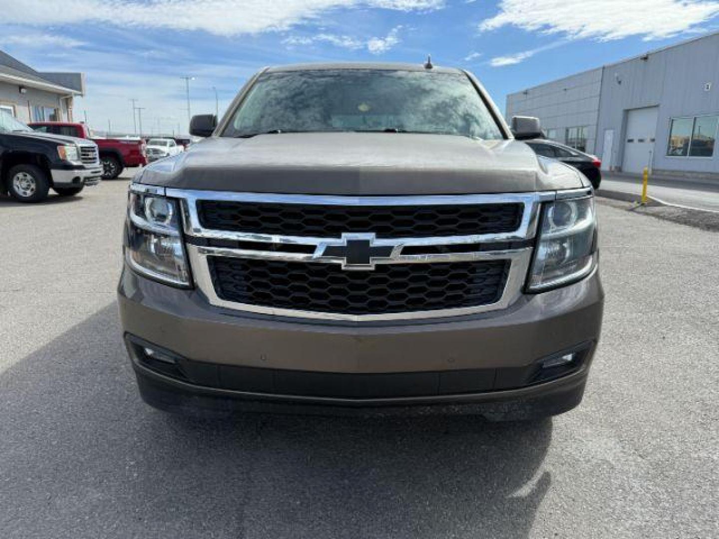 2015 BROWN /Cocoa/Dune Chevrolet Suburban 1500 (1GNSKJKC6FR) with an EcoTec3 53L V-8 gasoline direct injection engine, Automatic transmission, located at 1175 N Woodruff Ave, Idaho Falls, ID, 83401, 43.506901, -111.999657 - At Timberline Auto, finding a great deal on your next vehicle is always easy! Our experienced sales staff's goal is to help find you the right vehicle at the right price! Our knowledgeable finance department has options for almost any credit score. We offer extended service contract options to prote - Photo#9