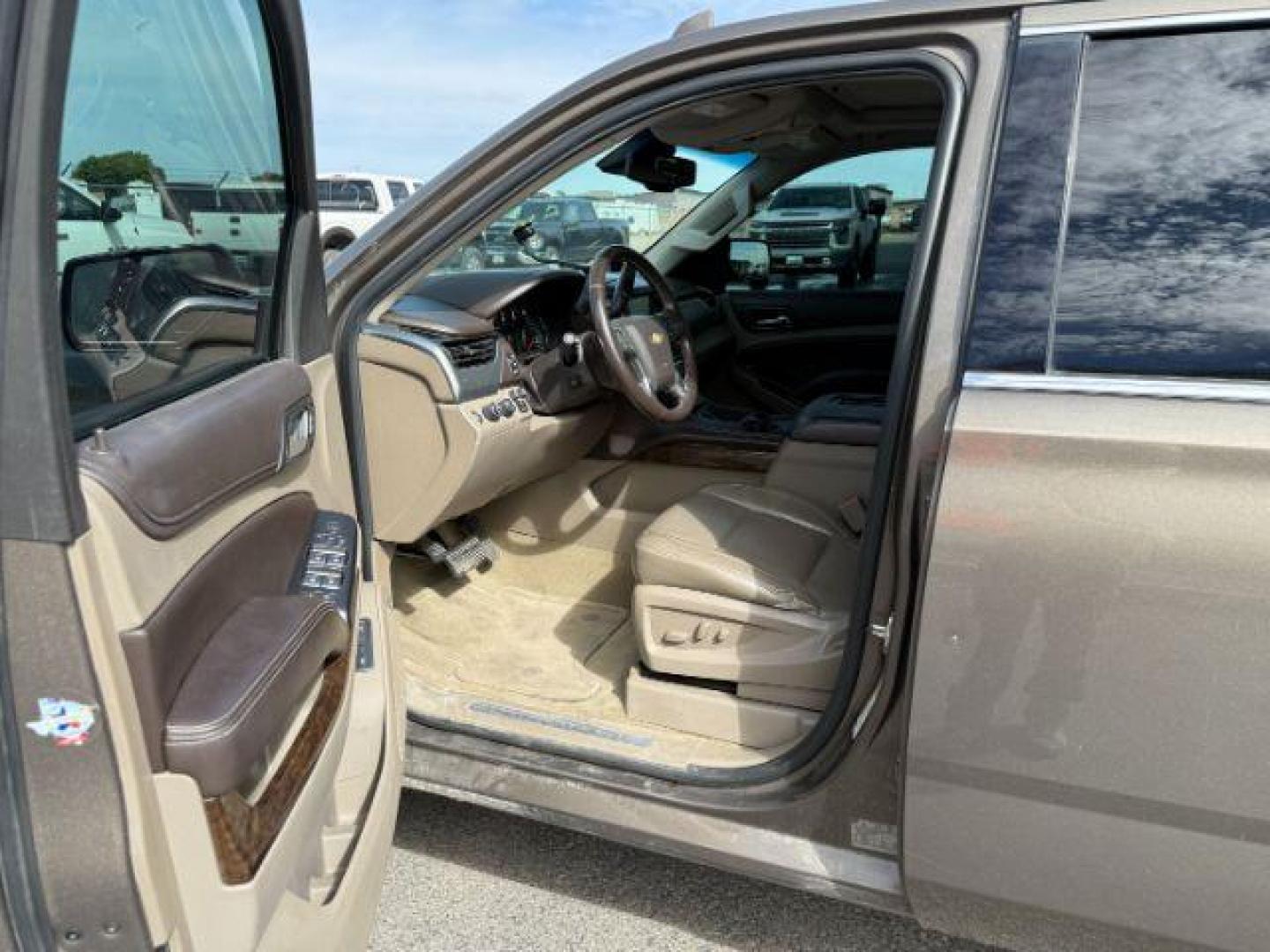 2015 BROWN /Cocoa/Dune Chevrolet Suburban 1500 (1GNSKJKC6FR) with an EcoTec3 53L V-8 gasoline direct injection engine, Automatic transmission, located at 1175 N Woodruff Ave, Idaho Falls, ID, 83401, 43.506901, -111.999657 - At Timberline Auto, finding a great deal on your next vehicle is always easy! Our experienced sales staff's goal is to help find you the right vehicle at the right price! Our knowledgeable finance department has options for almost any credit score. We offer extended service contract options to prote - Photo#11