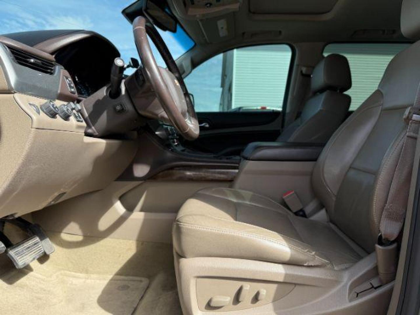 2015 BROWN /Cocoa/Dune Chevrolet Suburban 1500 (1GNSKJKC6FR) with an EcoTec3 53L V-8 gasoline direct injection engine, Automatic transmission, located at 1175 N Woodruff Ave, Idaho Falls, ID, 83401, 43.506901, -111.999657 - At Timberline Auto, finding a great deal on your next vehicle is always easy! Our experienced sales staff's goal is to help find you the right vehicle at the right price! Our knowledgeable finance department has options for almost any credit score. We offer extended service contract options to prote - Photo#12