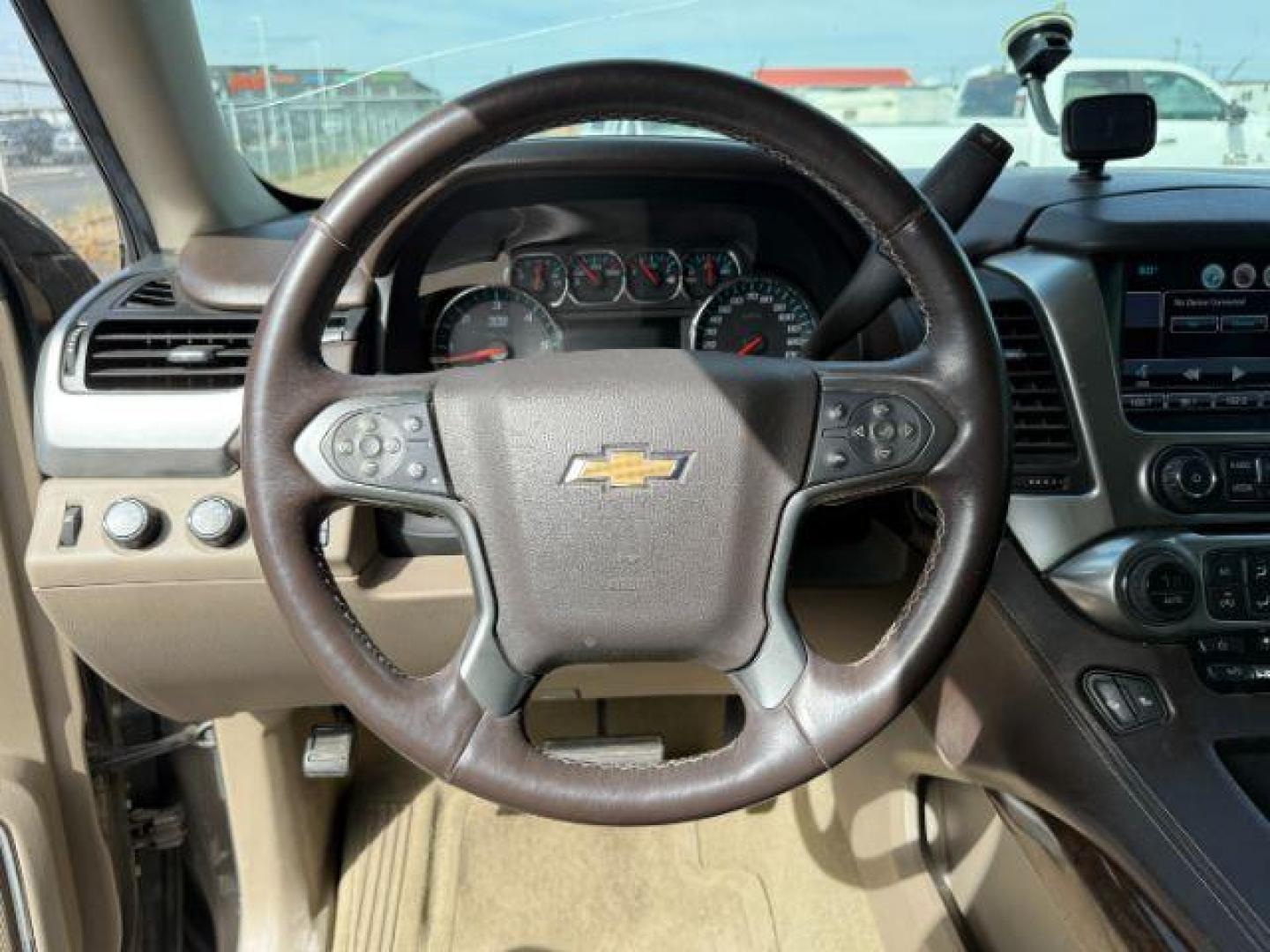 2015 BROWN /Cocoa/Dune Chevrolet Suburban 1500 (1GNSKJKC6FR) with an EcoTec3 53L V-8 gasoline direct injection engine, Automatic transmission, located at 1175 N Woodruff Ave, Idaho Falls, ID, 83401, 43.506901, -111.999657 - At Timberline Auto, finding a great deal on your next vehicle is always easy! Our experienced sales staff's goal is to help find you the right vehicle at the right price! Our knowledgeable finance department has options for almost any credit score. We offer extended service contract options to prote - Photo#14