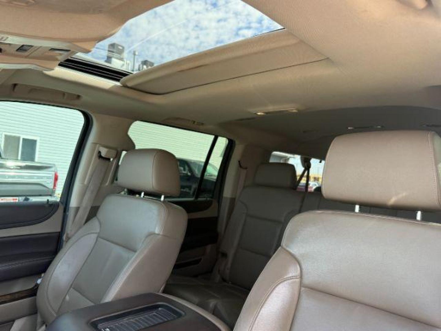 2015 BROWN /Cocoa/Dune Chevrolet Suburban 1500 (1GNSKJKC6FR) with an EcoTec3 53L V-8 gasoline direct injection engine, Automatic transmission, located at 1175 N Woodruff Ave, Idaho Falls, ID, 83401, 43.506901, -111.999657 - At Timberline Auto, finding a great deal on your next vehicle is always easy! Our experienced sales staff's goal is to help find you the right vehicle at the right price! Our knowledgeable finance department has options for almost any credit score. We offer extended service contract options to prote - Photo#18