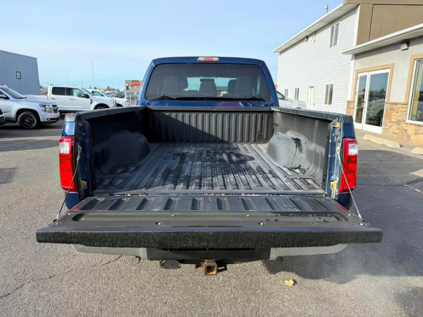 2011 BLUE /GRAY Ford F-250 (1FT7W2B65BE) with an Triton 62L V-8 variable valve control engine, Automatic transmission, located at 1175 N Woodruff Ave, Idaho Falls, ID, 83401, 43.506901, -111.999657 - At Timberline Auto, finding a great deal on your next vehicle is always easy! Our experienced sales staff's goal is to help find you the right vehicle at the right price! Our knowledgeable finance department has options for almost any credit score. We offer extended service contract options to prote - Photo#4