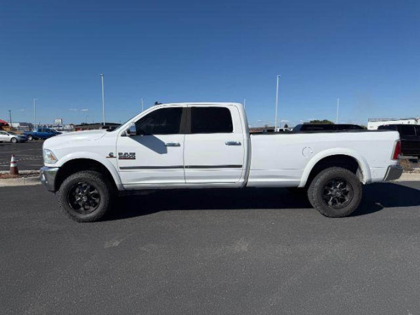 2016 Pearl White /Black Ram 3500 (3C63R3JL4GG) with an Cummins 67L I-6 diesel direct injection engine, Automatic transmission, located at 1175 N Woodruff Ave, Idaho Falls, ID, 83401, 43.506901, -111.999657 - At Timberline Auto, finding a great deal on your next vehicle is always easy! Our experienced sales staff's goal is to help find you the right vehicle at the right price! Our knowledgeable finance department has options for almost any credit score. We offer extended service contract options to prote - Photo#1