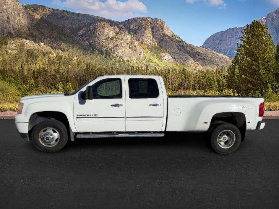 2012 Summit White /Ebony GMC Sierra 3500HD Denali (1GT426C86CF) with an 6.6L V8 16V OHV TURBO DIESEL engine, AUTOMATIC transmission, located at 1235 N Woodruff Ave., Idaho Falls, 83401, (208) 523-1053, 43.507172, -112.000488 - At Timberline Auto, finding a great deal on your next vehicle is always easy! Our experienced sales staff's goal is to help find you the right vehicle at the right price! Our knowledgeable finance department has options for almost any credit score. We offer extended service contract options to prote - Photo#1