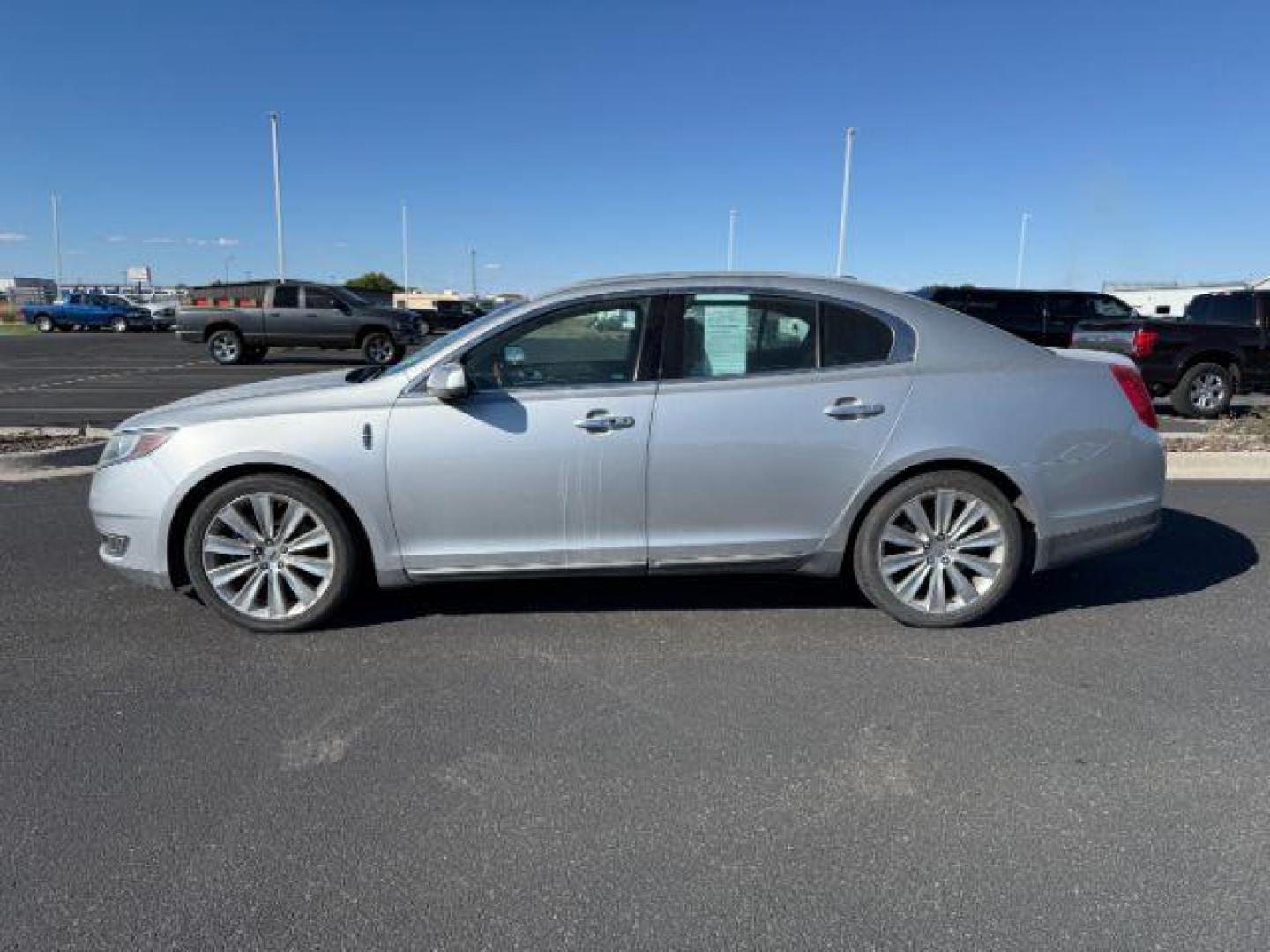2013 Silver Diamond Premium Coat Metallic /Charcoal Black Lincoln MKS (1LNHL9FT3DG) with an EcoBoost 35L V-6 gasoline direct injection engine, Automatic transmission, located at 1175 N Woodruff Ave, Idaho Falls, ID, 83401, 43.506901, -111.999657 - At Timberline Auto, finding a great deal on your next vehicle is always easy! Our experienced sales staff's goal is to help find you the right vehicle at the right price! Our knowledgeable finance department has options for almost any credit score. We offer extended service contract options to prote - Photo#1
