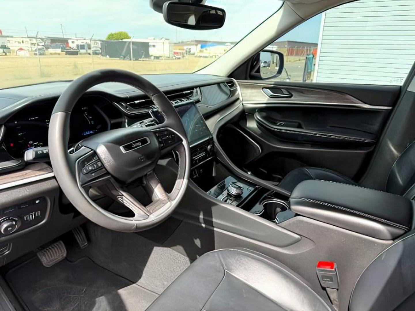 2022 BLACK /Global Black Jeep Grand Cherokee 4xe (1C4RJYB63N8) with an 2L I-4 HYBRID engine, Automatic transmission, located at 1175 N Woodruff Ave, Idaho Falls, ID, 83401, 43.506901, -111.999657 - At Timberline Auto, finding a great deal on your next vehicle is always easy! Our experienced sales staff's goal is to help find you the right vehicle at the right price! Our knowledgeable finance department has options for almost any credit score. We offer extended service contract options to prote - Photo#16