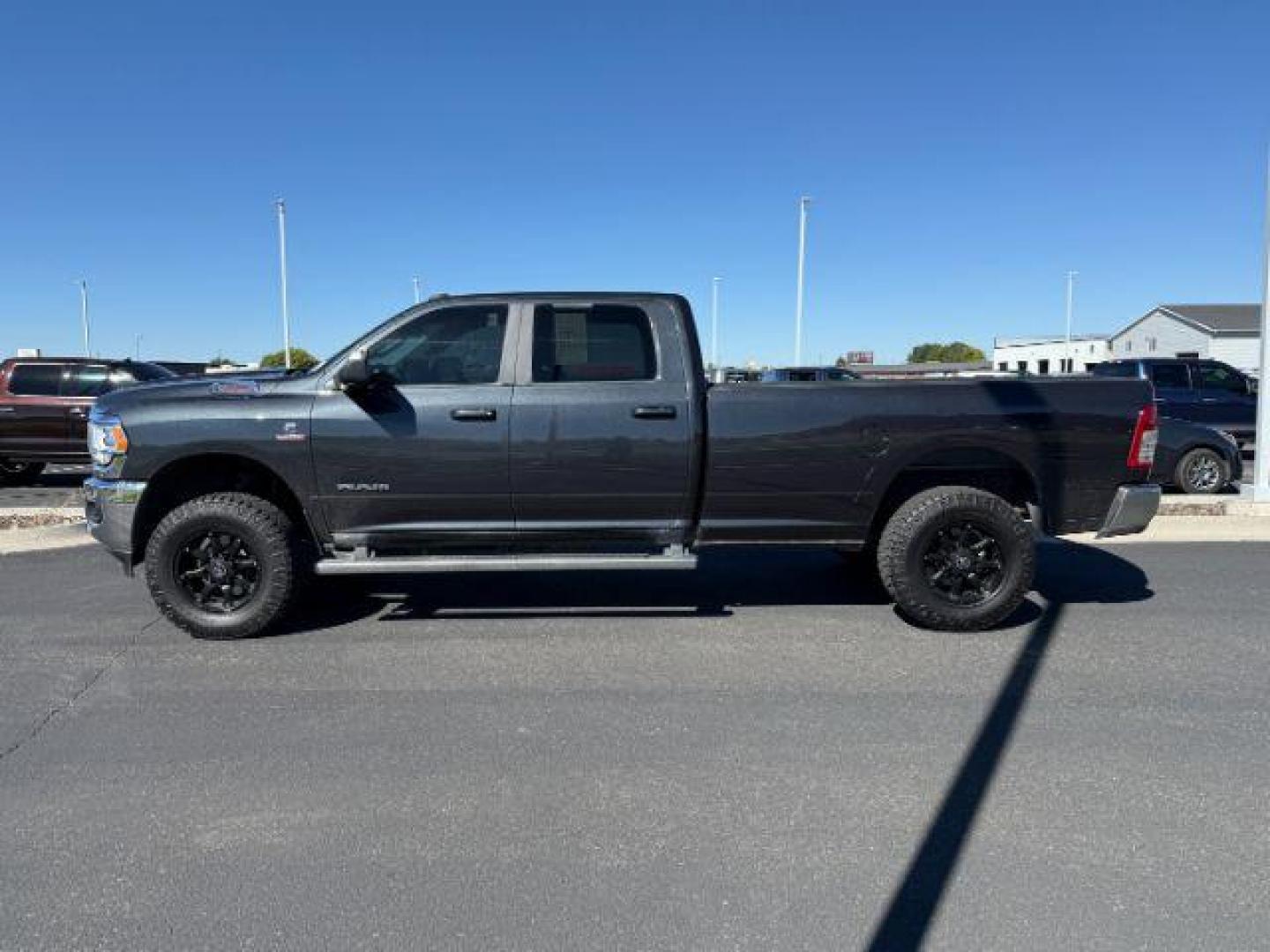 2021 GRAY /Diesel Gray/Black Ram 3500 Big Horn Crew Cab 4x4 8' Box (3C63R3HL8MG) with an Cummins High Output 6.7L I-6 diesel direct injecti engine, AUTOMATIC transmission, located at 1235 N Woodruff Ave., Idaho Falls, 83401, (208) 523-1053, 43.507172, -112.000488 - At Timberline Auto, finding a great deal on your next vehicle is always easy! Our experienced sales staff's goal is to help find you the right vehicle at the right price! Our knowledgeable finance department has options for almost any credit score. We offer extended service contract options to prote - Photo#1