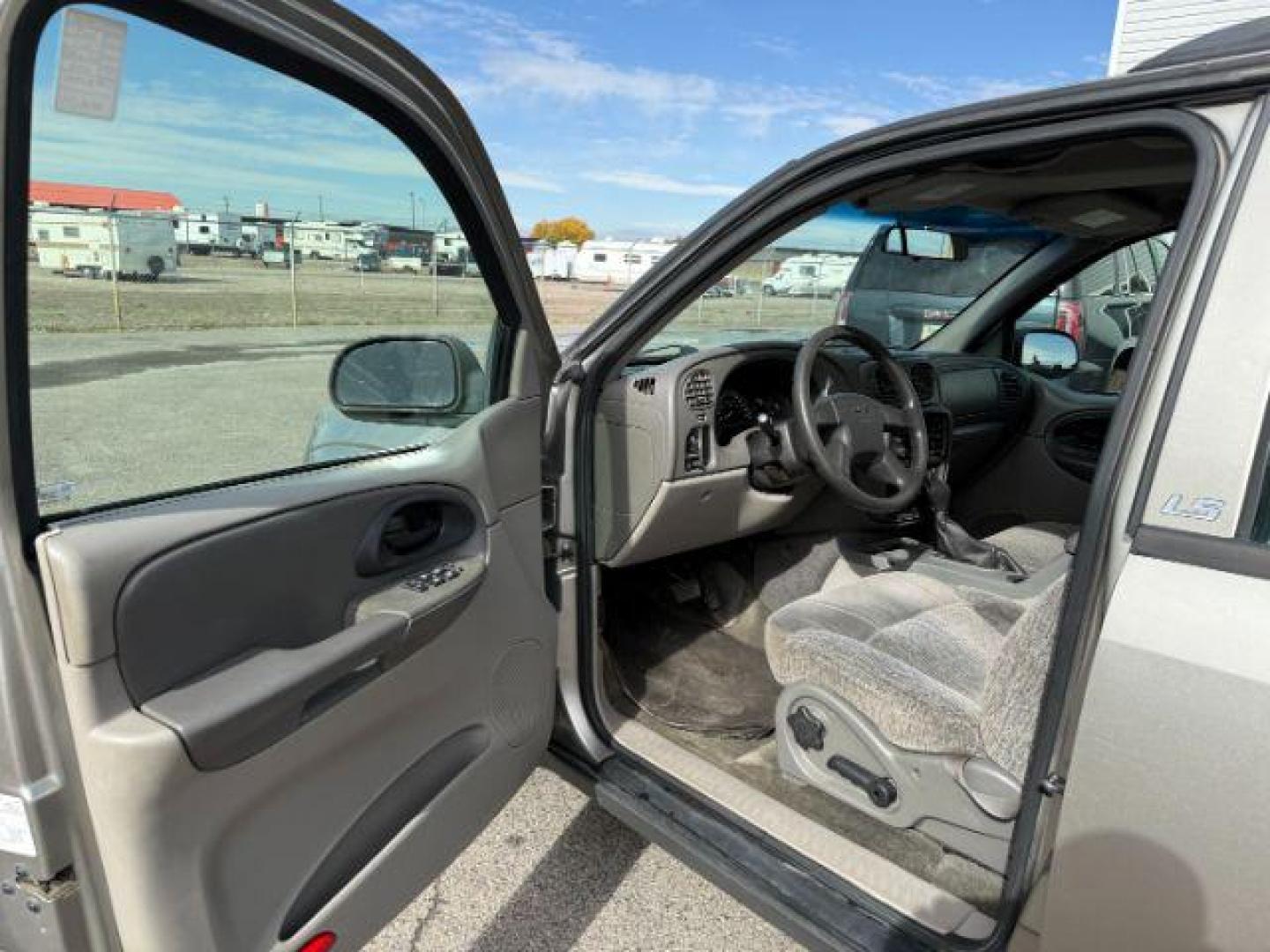2003 GOLD /Medium Pewter Chevrolet TrailBlazer (1GNDT13S432) with an Vortec 42L I-6 DOHC engine, Automatic transmission, located at 1175 N Woodruff Ave, Idaho Falls, ID, 83401, 43.506901, -111.999657 - At Timberline Auto, finding a great deal on your next vehicle is always easy! Our experienced sales staff's goal is to help find you the right vehicle at the right price! Our knowledgeable finance department has options for almost any credit score. We offer extended service contract options to prote - Photo#28