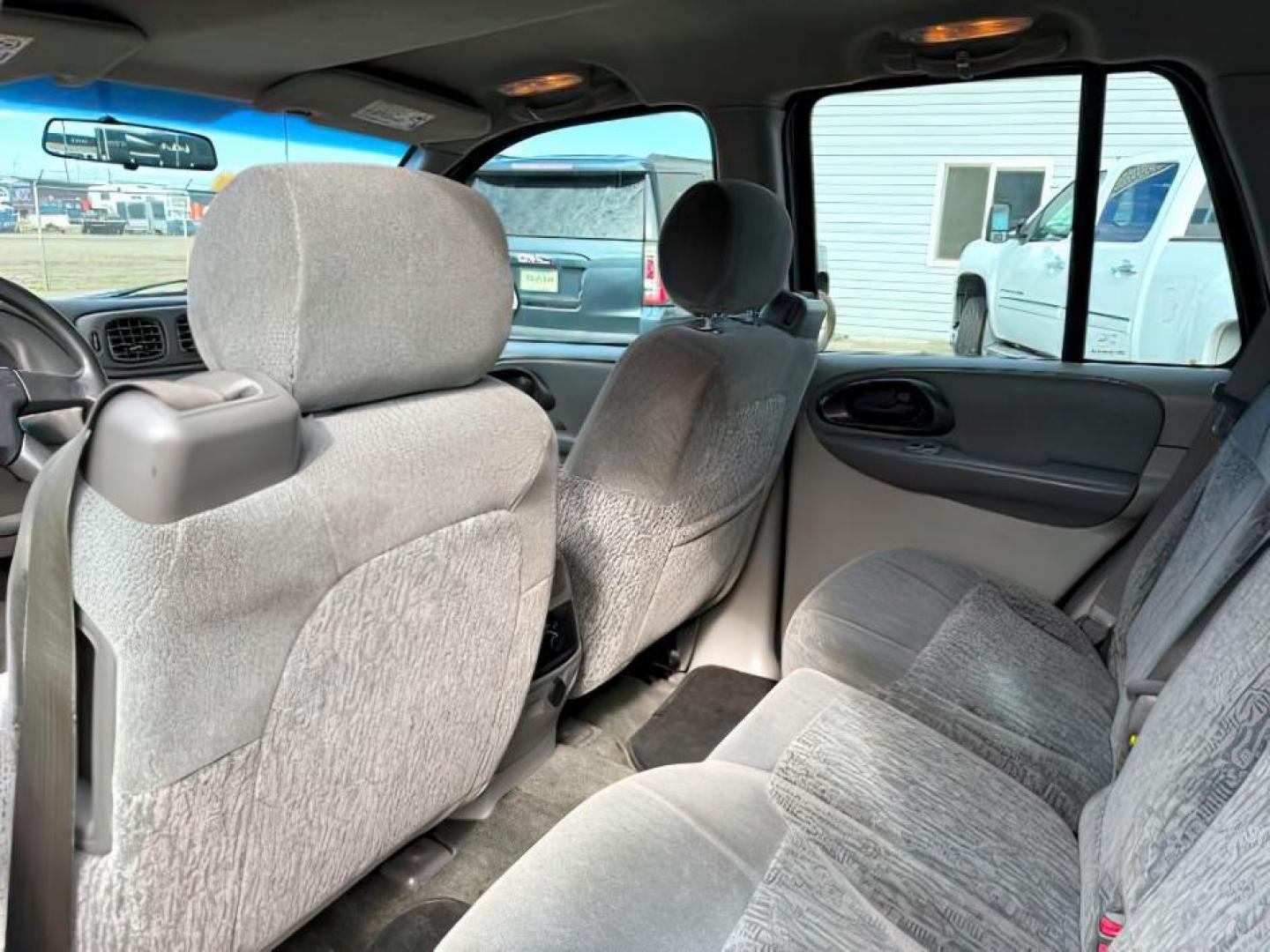 2003 GOLD /Medium Pewter Chevrolet TrailBlazer (1GNDT13S432) with an Vortec 42L I-6 DOHC engine, Automatic transmission, located at 1175 N Woodruff Ave, Idaho Falls, ID, 83401, 43.506901, -111.999657 - At Timberline Auto, finding a great deal on your next vehicle is always easy! Our experienced sales staff's goal is to help find you the right vehicle at the right price! Our knowledgeable finance department has options for almost any credit score. We offer extended service contract options to prote - Photo#17