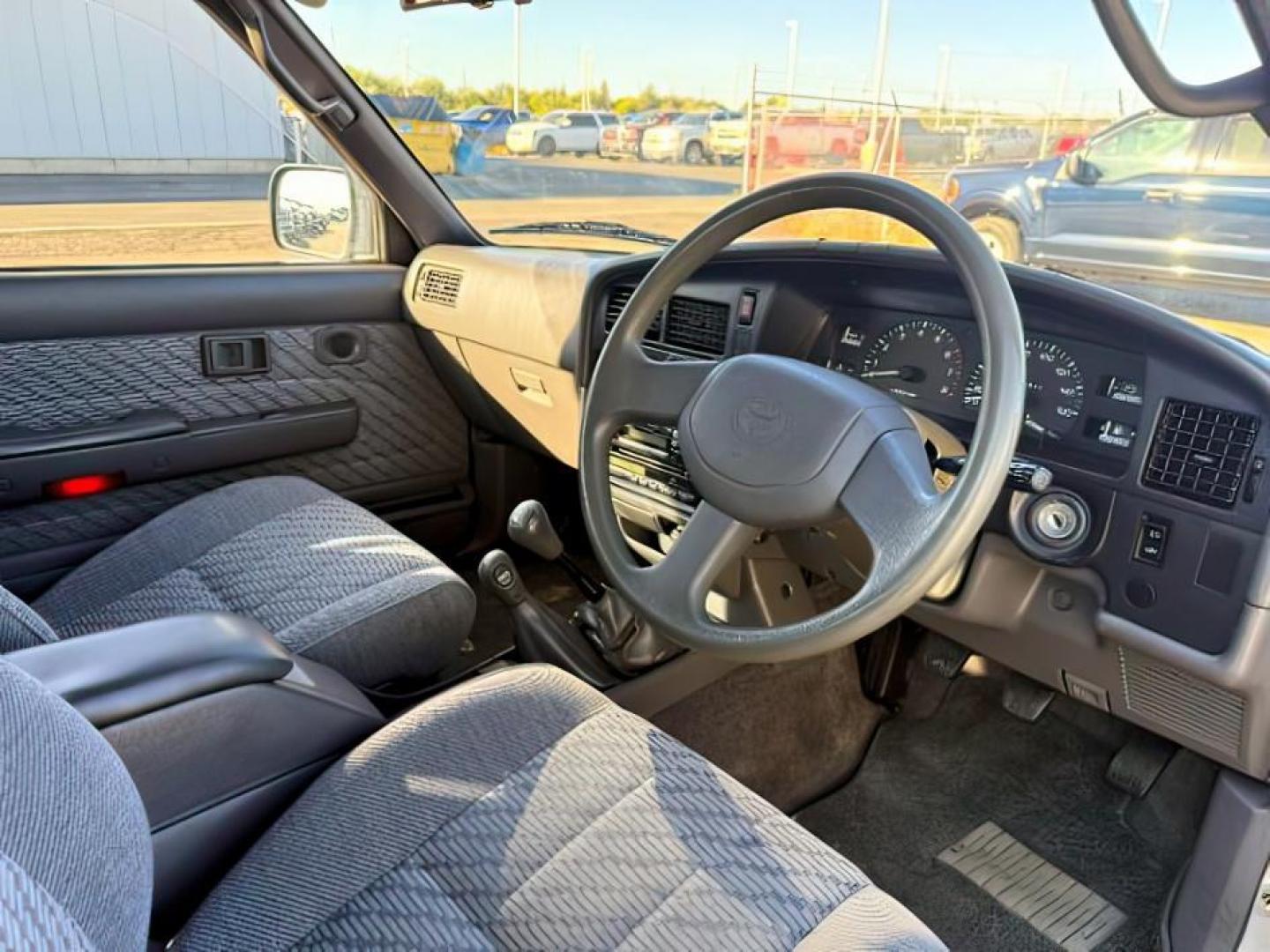 1996 SILVER /GREY CLOTH Toyota HILUX (YN107000216) , Manual transmission, located at 1175 N Woodruff Ave, Idaho Falls, ID, 83401, 43.506901, -111.999657 - At Timberline Auto, finding a great deal on your next vehicle is always easy! Our experienced sales staff's goal is to help find you the right vehicle at the right price! Our knowledgeable finance department has options for almost any credit score. We offer extended service contract options to prote - Photo#9