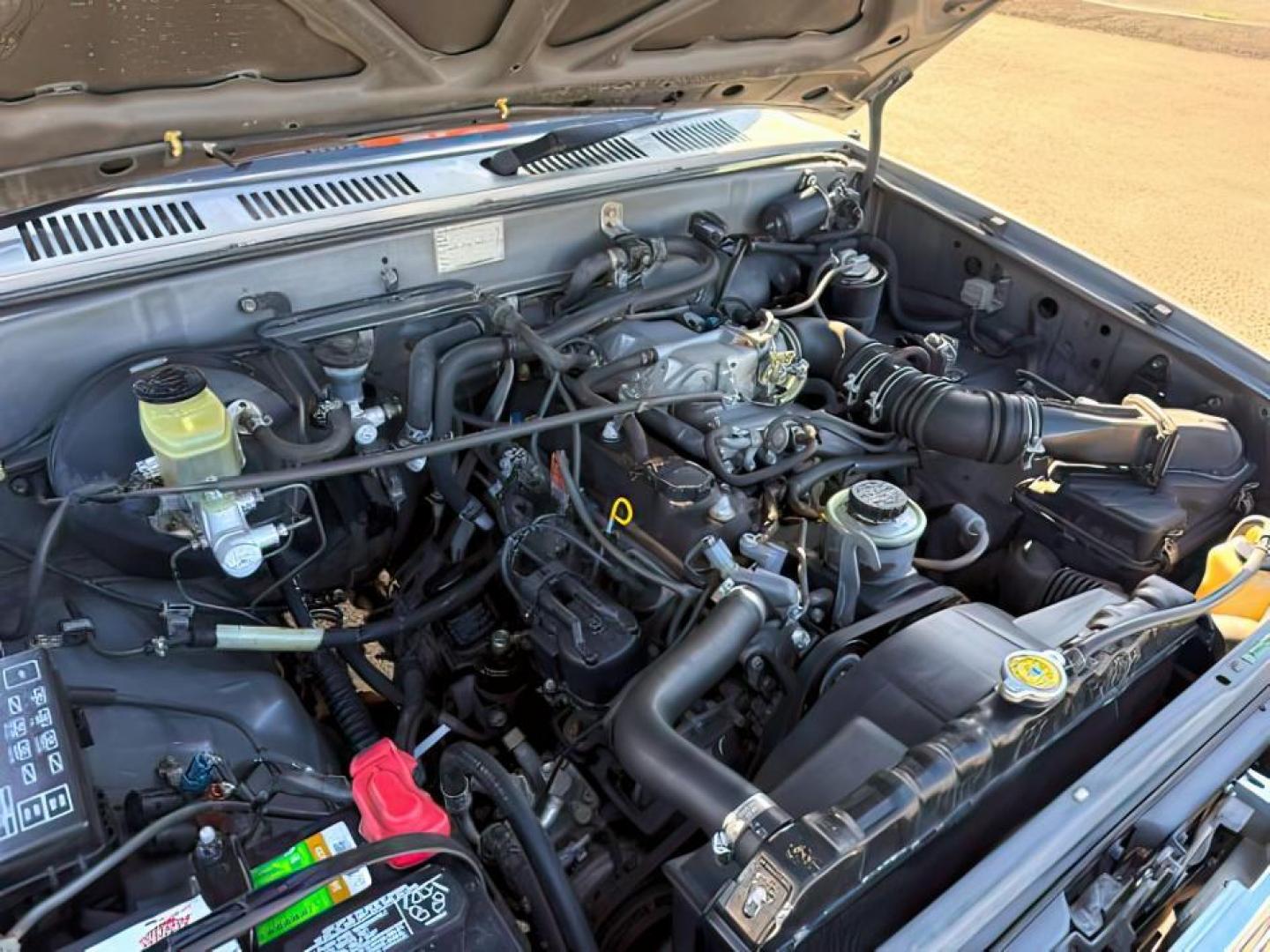 1996 SILVER /GREY CLOTH Toyota HILUX (YN107000216) , Manual transmission, located at 1175 N Woodruff Ave, Idaho Falls, ID, 83401, 43.506901, -111.999657 - At Timberline Auto, finding a great deal on your next vehicle is always easy! Our experienced sales staff's goal is to help find you the right vehicle at the right price! Our knowledgeable finance department has options for almost any credit score. We offer extended service contract options to prote - Photo#16