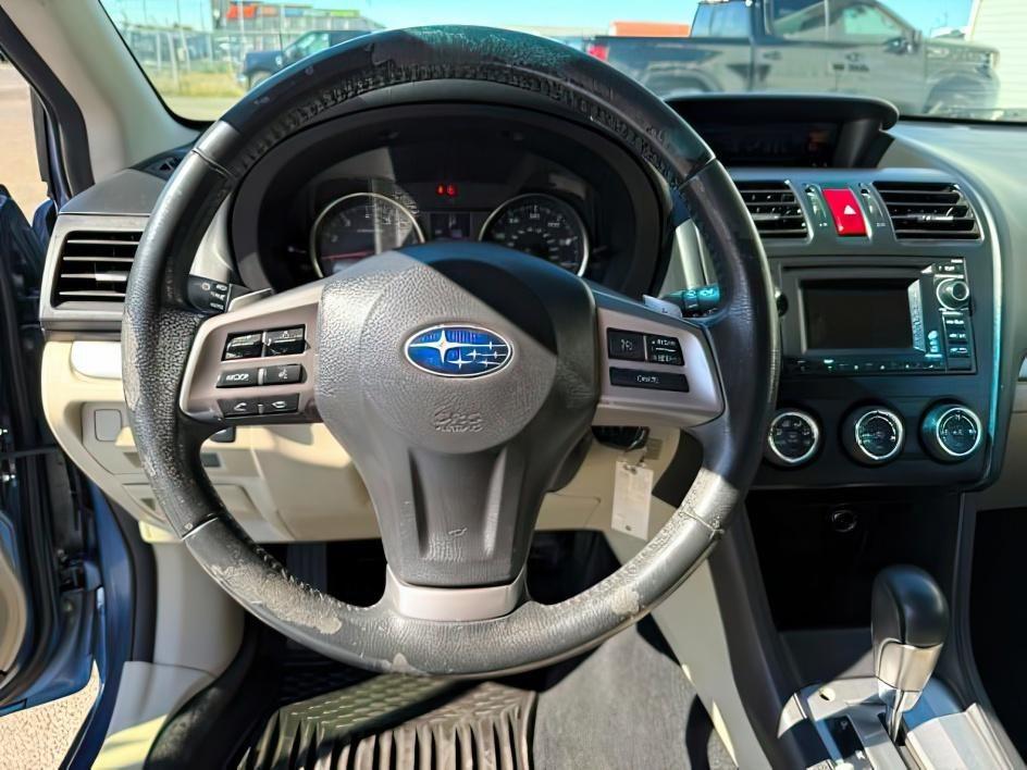 2014 Quartz Blue Pearl /Ivory Subaru XV Crosstrek 2.0 Limited (JF2GPAGC7E8) with an 2.0L L4 DOHC 16V engine, Continuously Variable Transmission transmission, located at 1235 N Woodruff Ave., Idaho Falls, 83401, (208) 523-1053, 43.507172, -112.000488 - This 2014 Subaru XV Crosstrek is a compact AWD crossover built for confident all-weather driving and light adventure use. Powered by a 2.0L boxer engine, it delivers efficient performance for daily commuting while maintaining steady capability in snow, rain, and gravel conditions thanks to Subaru's- Photo#14