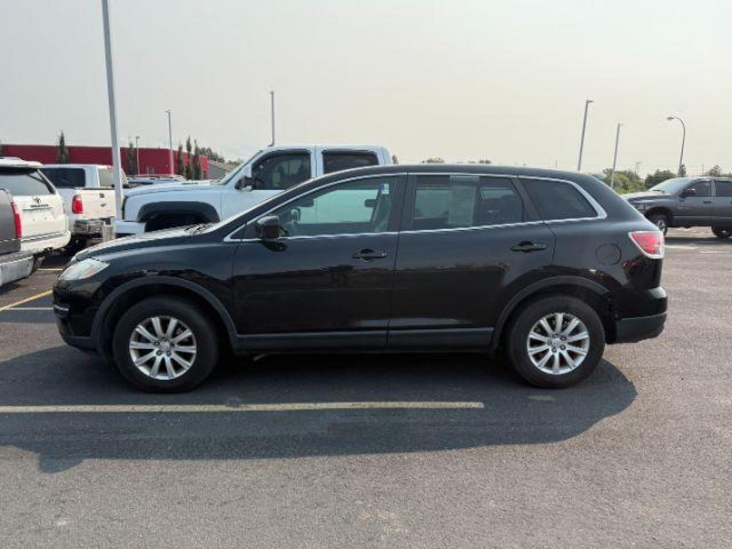 2009 BLACK Mazda CX-9 (JM3TB38A390) with an 37 engine, Automatic transmission, located at 1175 N Woodruff Ave, Idaho Falls, ID, 83401, 43.506901, -111.999657 - At Timberline Auto, finding a great deal on your next vehicle is always easy! Our experienced sales staff's goal is to help find you the right vehicle at the right price! Our knowledgeable finance department has options for almost any credit score. We offer extended service contract options to prote - Photo#0