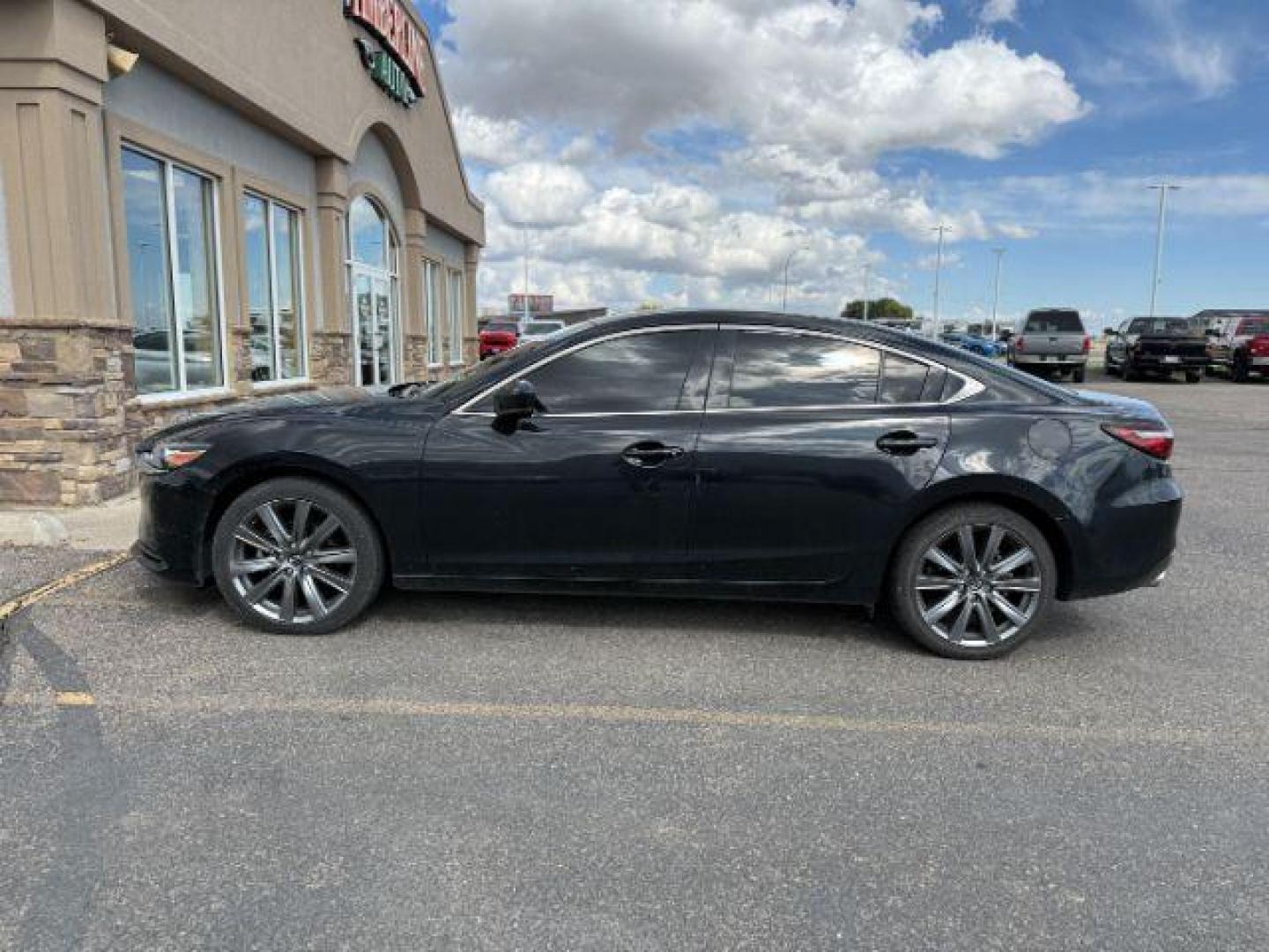 2021 BLACK Mazda Mazda6 (JM1GL1VMXM1) , located at 1175 N Woodruff Ave, Idaho Falls, ID, 83401, 43.506901, -111.999657 - At Timberline Auto, finding a great deal on your next vehicle is always easy! Our experienced sales staff's goal is to help find you the right vehicle at the right price! Our knowledgeable finance department has options for almost any credit score. We offer extended service contract options to prote - Photo#0