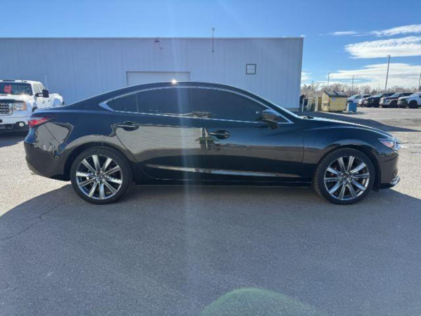 2021 BLACK /LEATHER Mazda Mazda6 (JM1GL1VMXM1) with an 25 engine, Automatic transmission, located at 1175 N Woodruff Ave, Idaho Falls, ID, 83401, 43.506901, -111.999657 - At Timberline Auto, finding a great deal on your next vehicle is always easy! Our experienced sales staff's goal is to help find you the right vehicle at the right price! Our knowledgeable finance department has options for almost any credit score. We offer extended service contract options to prote - Photo#29