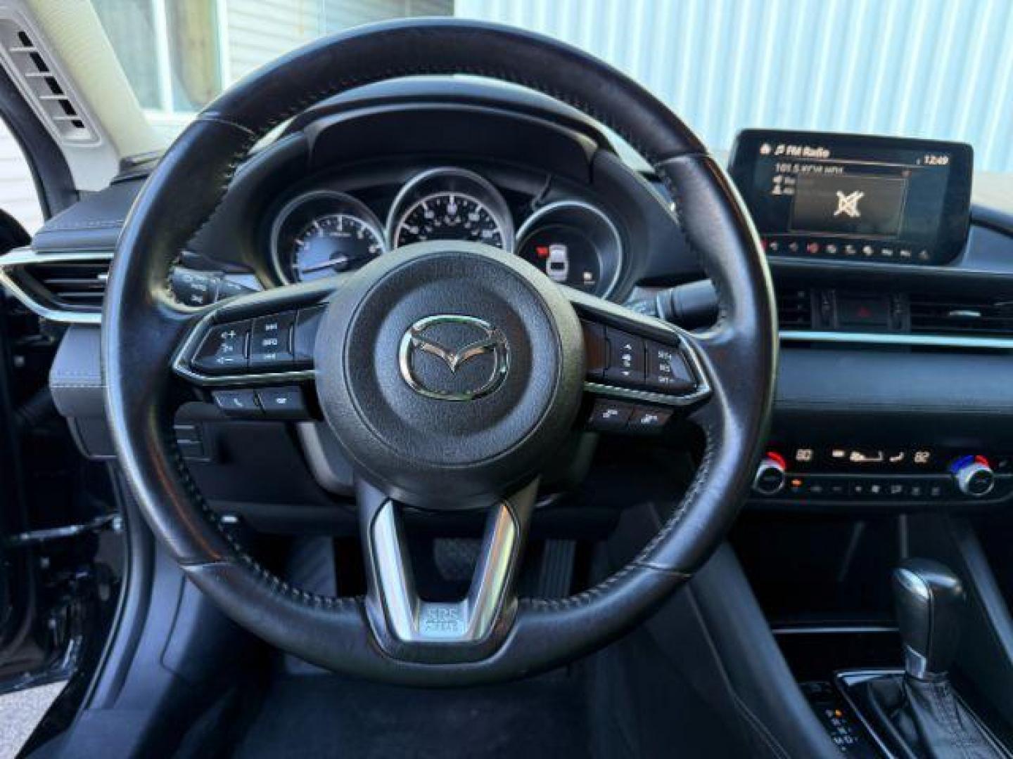 2021 BLACK /LEATHER Mazda Mazda6 (JM1GL1VMXM1) with an 25 engine, Automatic transmission, located at 1175 N Woodruff Ave, Idaho Falls, ID, 83401, 43.506901, -111.999657 - At Timberline Auto, finding a great deal on your next vehicle is always easy! Our experienced sales staff's goal is to help find you the right vehicle at the right price! Our knowledgeable finance department has options for almost any credit score. We offer extended service contract options to prote - Photo#36