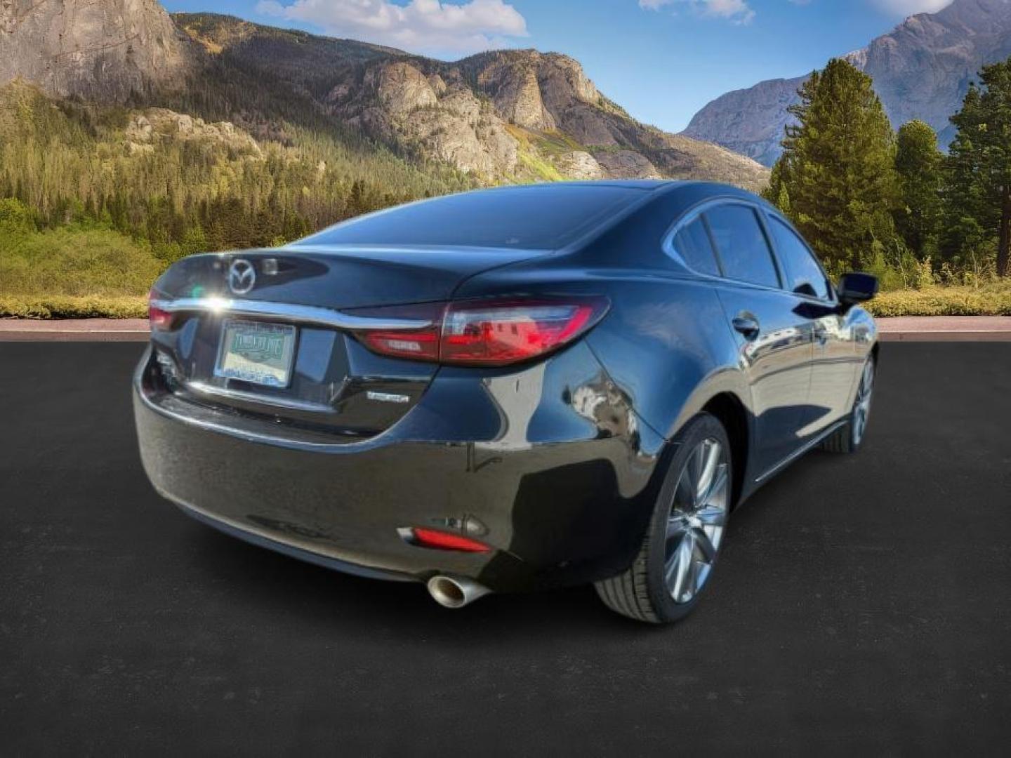 2021 BLACK /LEATHER Mazda Mazda6 (JM1GL1VMXM1) with an 25 engine, Automatic transmission, located at 1175 N Woodruff Ave, Idaho Falls, ID, 83401, 43.506901, -111.999657 - At Timberline Auto, finding a great deal on your next vehicle is always easy! Our experienced sales staff's goal is to help find you the right vehicle at the right price! Our knowledgeable finance department has options for almost any credit score. We offer extended service contract options to prote - Photo#5