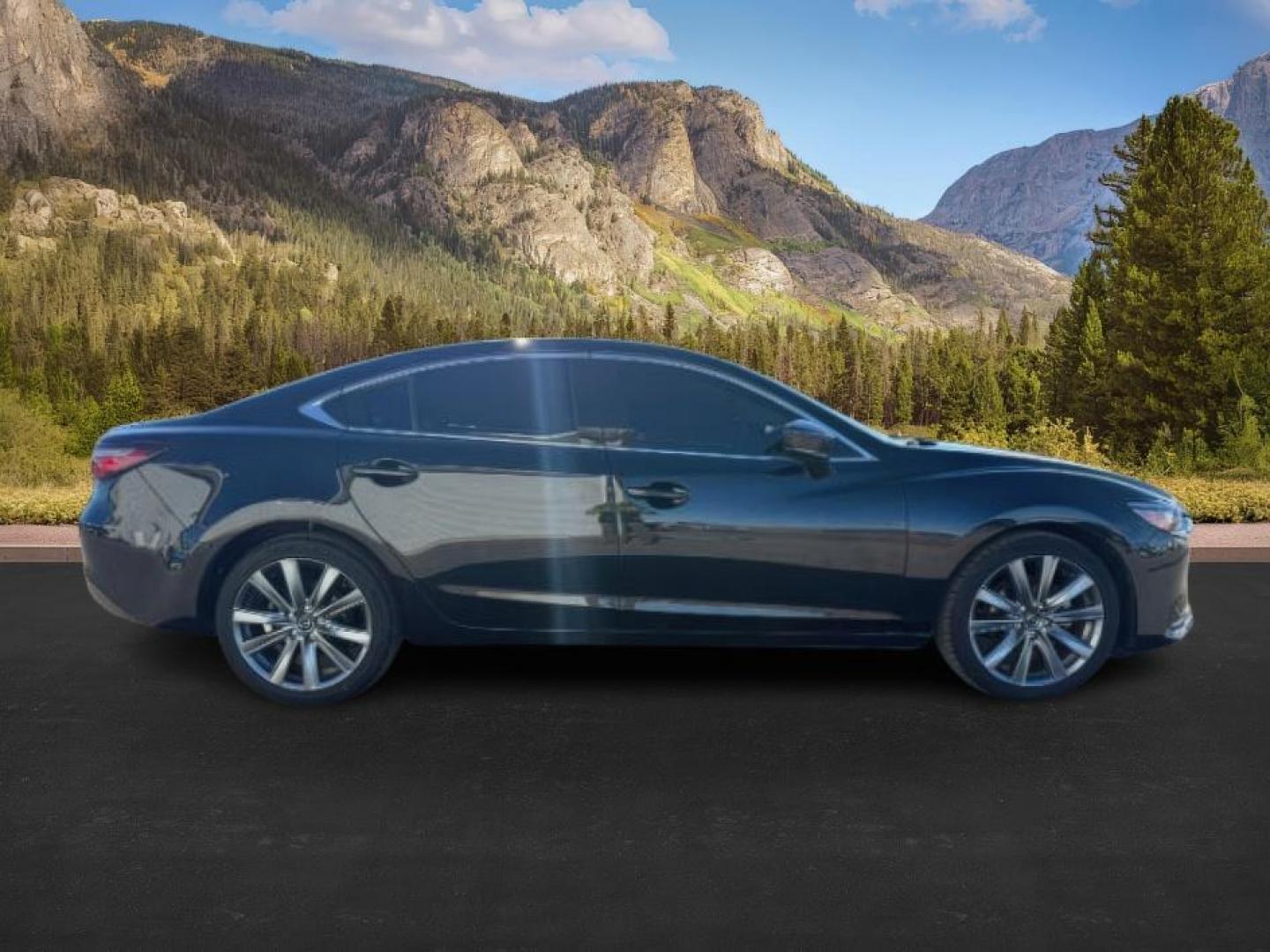 2021 BLACK /LEATHER Mazda Mazda6 (JM1GL1VMXM1) with an 25 engine, Automatic transmission, located at 1175 N Woodruff Ave, Idaho Falls, ID, 83401, 43.506901, -111.999657 - At Timberline Auto, finding a great deal on your next vehicle is always easy! Our experienced sales staff's goal is to help find you the right vehicle at the right price! Our knowledgeable finance department has options for almost any credit score. We offer extended service contract options to prote - Photo#6