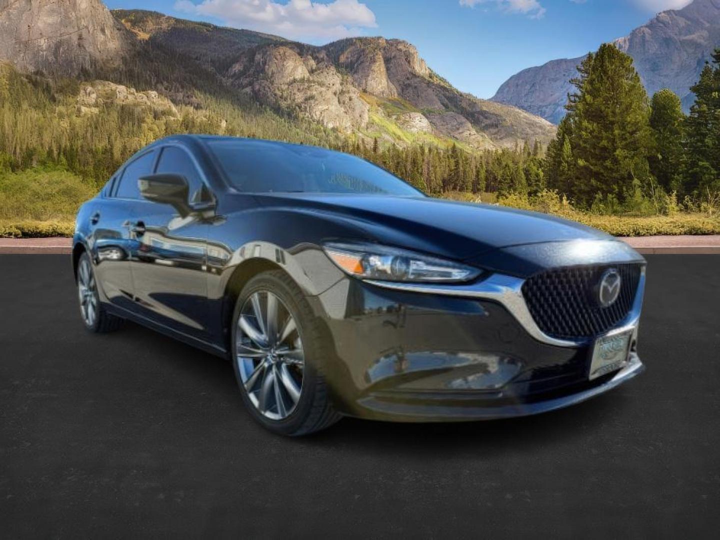 2021 BLACK /LEATHER Mazda Mazda6 (JM1GL1VMXM1) with an 25 engine, Automatic transmission, located at 1175 N Woodruff Ave, Idaho Falls, ID, 83401, 43.506901, -111.999657 - At Timberline Auto, finding a great deal on your next vehicle is always easy! Our experienced sales staff's goal is to help find you the right vehicle at the right price! Our knowledgeable finance department has options for almost any credit score. We offer extended service contract options to prote - Photo#7