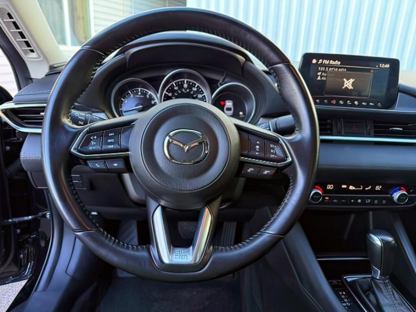 2021 BLACK /LEATHER Mazda Mazda6 (JM1GL1VMXM1) with an 25 engine, Automatic transmission, located at 1175 N Woodruff Ave, Idaho Falls, ID, 83401, 43.506901, -111.999657 - At Timberline Auto, finding a great deal on your next vehicle is always easy! Our experienced sales staff's goal is to help find you the right vehicle at the right price! Our knowledgeable finance department has options for almost any credit score. We offer extended service contract options to prote - Photo#13