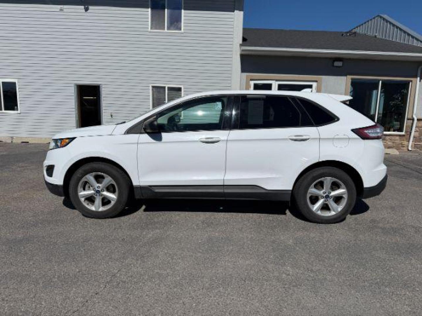 2015 Oxford White /Ebony Ford Edge (2FMTK3G82FB) with an 35L V-6 DOHC engine, Automatic transmission, located at 1175 N Woodruff Ave, Idaho Falls, ID, 83401, 43.506901, -111.999657 - At Timberline Auto, finding a great deal on your next vehicle is always easy! Our experienced sales staff's goal is to help find you the right vehicle at the right price! Our knowledgeable finance department has options for almost any credit score. We offer extended service contract options to prote - Photo#21