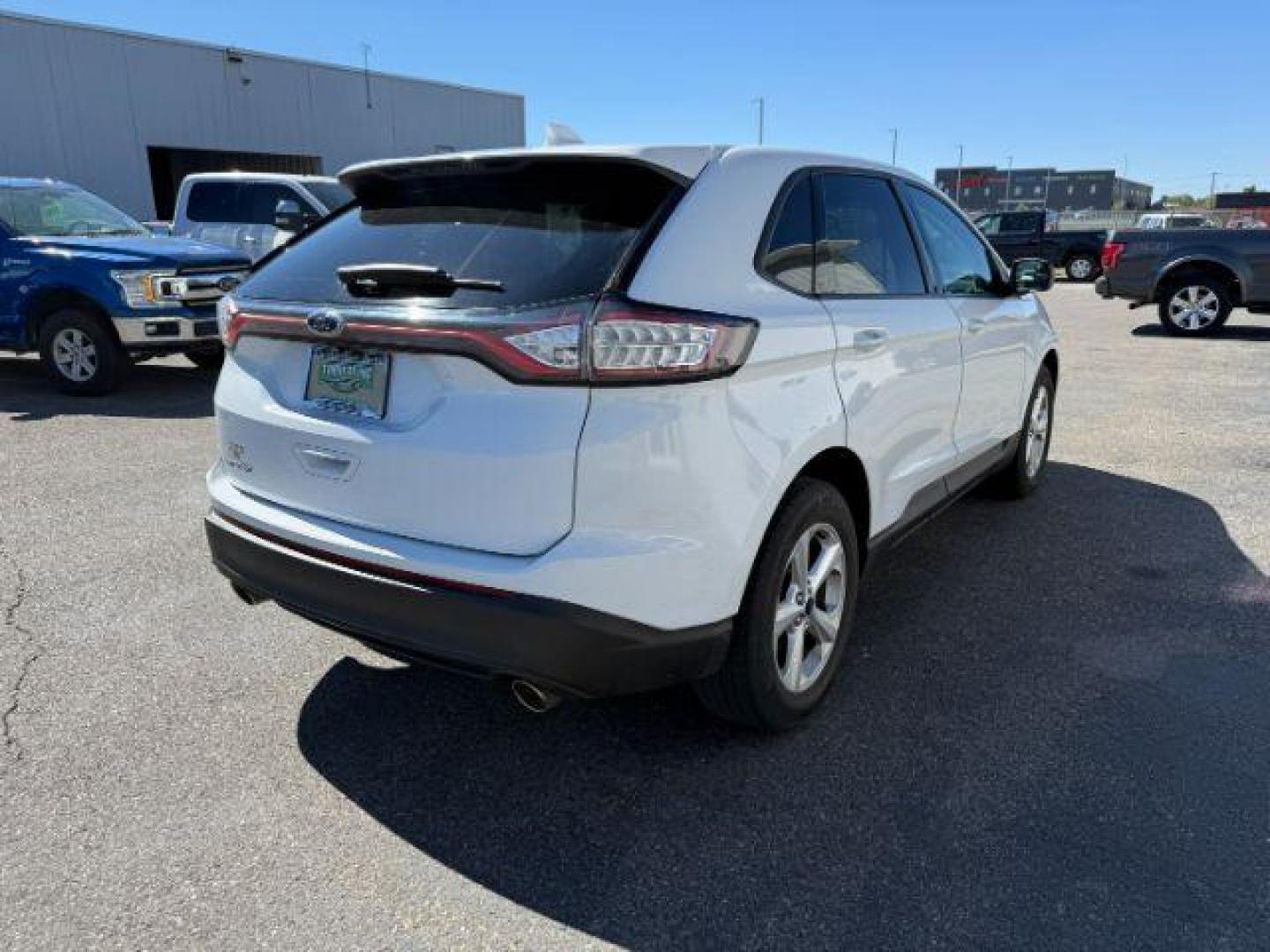 2015 Oxford White /Ebony Ford Edge (2FMTK3G82FB) with an 35L V-6 DOHC engine, Automatic transmission, located at 1175 N Woodruff Ave, Idaho Falls, ID, 83401, 43.506901, -111.999657 - At Timberline Auto, finding a great deal on your next vehicle is always easy! Our experienced sales staff's goal is to help find you the right vehicle at the right price! Our knowledgeable finance department has options for almost any credit score. We offer extended service contract options to prote - Photo#26