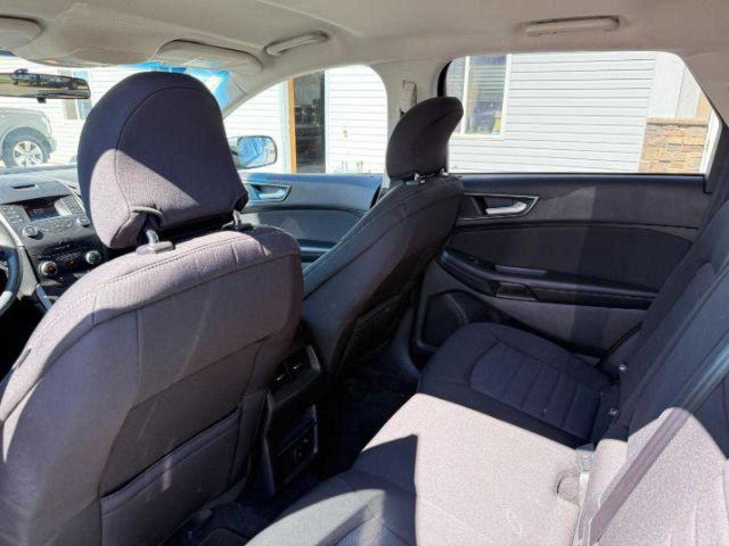 2015 Oxford White /Ebony Ford Edge (2FMTK3G82FB) with an 35L V-6 DOHC engine, Automatic transmission, located at 1175 N Woodruff Ave, Idaho Falls, ID, 83401, 43.506901, -111.999657 - At Timberline Auto, finding a great deal on your next vehicle is always easy! Our experienced sales staff's goal is to help find you the right vehicle at the right price! Our knowledgeable finance department has options for almost any credit score. We offer extended service contract options to prote - Photo#39