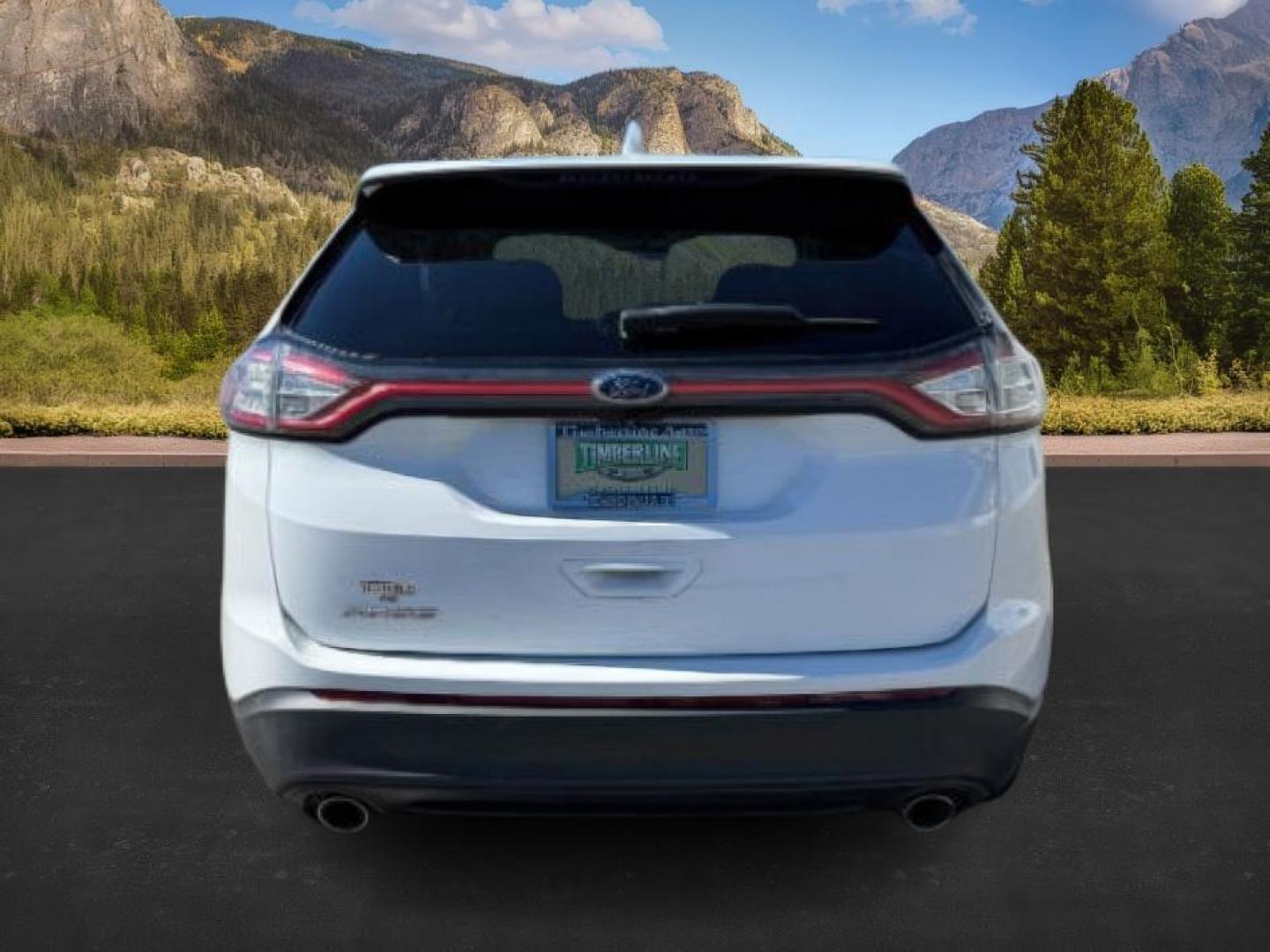 2015 Oxford White /Ebony Ford Edge (2FMTK3G82FB) with an 35L V-6 DOHC engine, Automatic transmission, located at 1175 N Woodruff Ave, Idaho Falls, ID, 83401, 43.506901, -111.999657 - At Timberline Auto, finding a great deal on your next vehicle is always easy! Our experienced sales staff's goal is to help find you the right vehicle at the right price! Our knowledgeable finance department has options for almost any credit score. We offer extended service contract options to prote - Photo#3