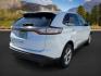 2015 Oxford White /Ebony Ford Edge (2FMTK3G82FB) with an 35L V-6 DOHC engine, Automatic transmission, located at 1175 N Woodruff Ave, Idaho Falls, ID, 83401, 43.506901, -111.999657 - At Timberline Auto, finding a great deal on your next vehicle is always easy! Our experienced sales staff's goal is to help find you the right vehicle at the right price! Our knowledgeable finance department has options for almost any credit score. We offer extended service contract options to prote - Photo#6