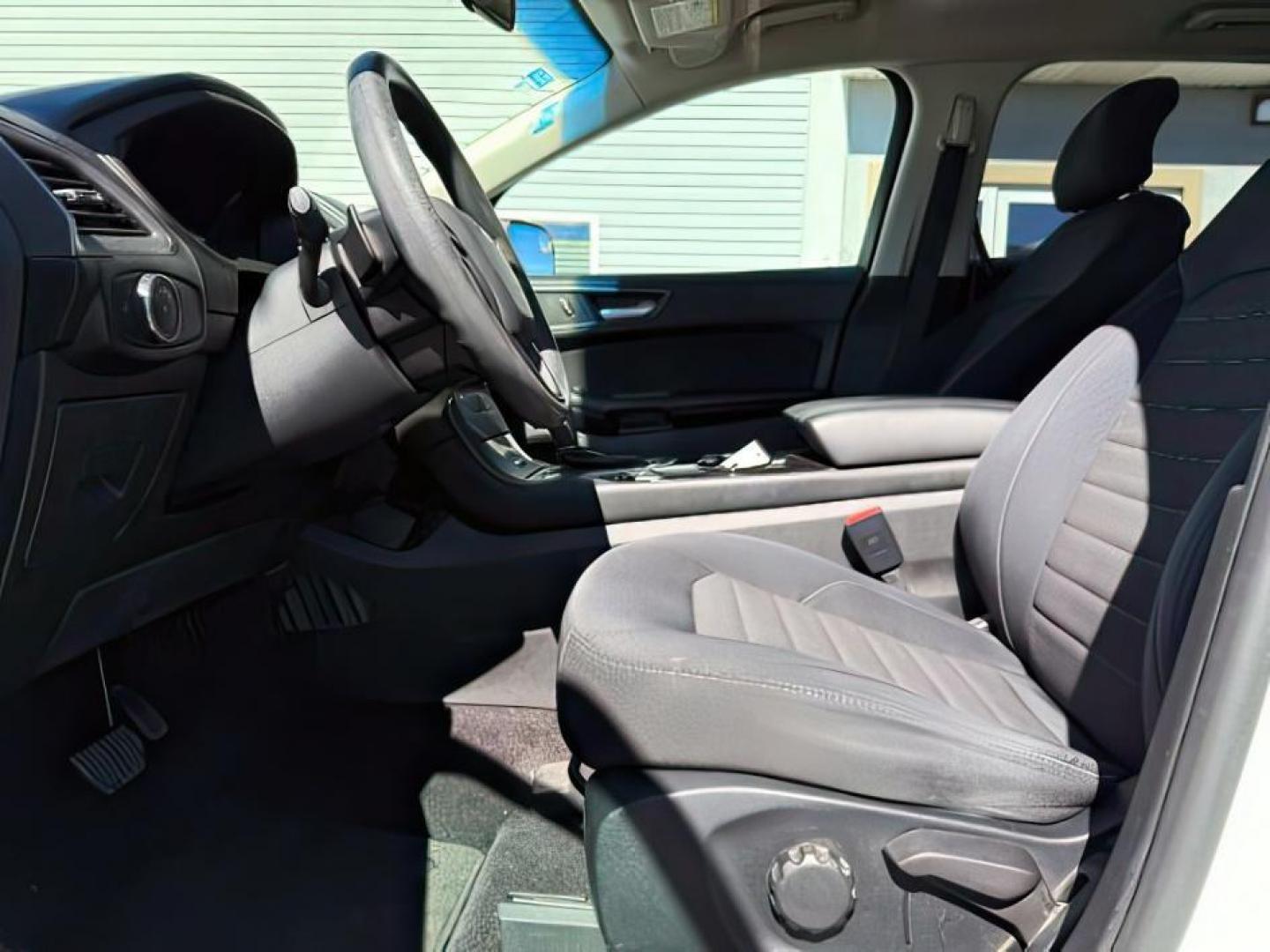 2015 Oxford White /Ebony Ford Edge (2FMTK3G82FB) with an 35L V-6 DOHC engine, Automatic transmission, located at 1175 N Woodruff Ave, Idaho Falls, ID, 83401, 43.506901, -111.999657 - At Timberline Auto, finding a great deal on your next vehicle is always easy! Our experienced sales staff's goal is to help find you the right vehicle at the right price! Our knowledgeable finance department has options for almost any credit score. We offer extended service contract options to prote - Photo#12