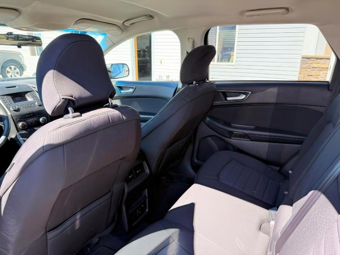2015 Oxford White /Ebony Ford Edge (2FMTK3G82FB) with an 35L V-6 DOHC engine, Automatic transmission, located at 1175 N Woodruff Ave, Idaho Falls, ID, 83401, 43.506901, -111.999657 - At Timberline Auto, finding a great deal on your next vehicle is always easy! Our experienced sales staff's goal is to help find you the right vehicle at the right price! Our knowledgeable finance department has options for almost any credit score. We offer extended service contract options to prote - Photo#19