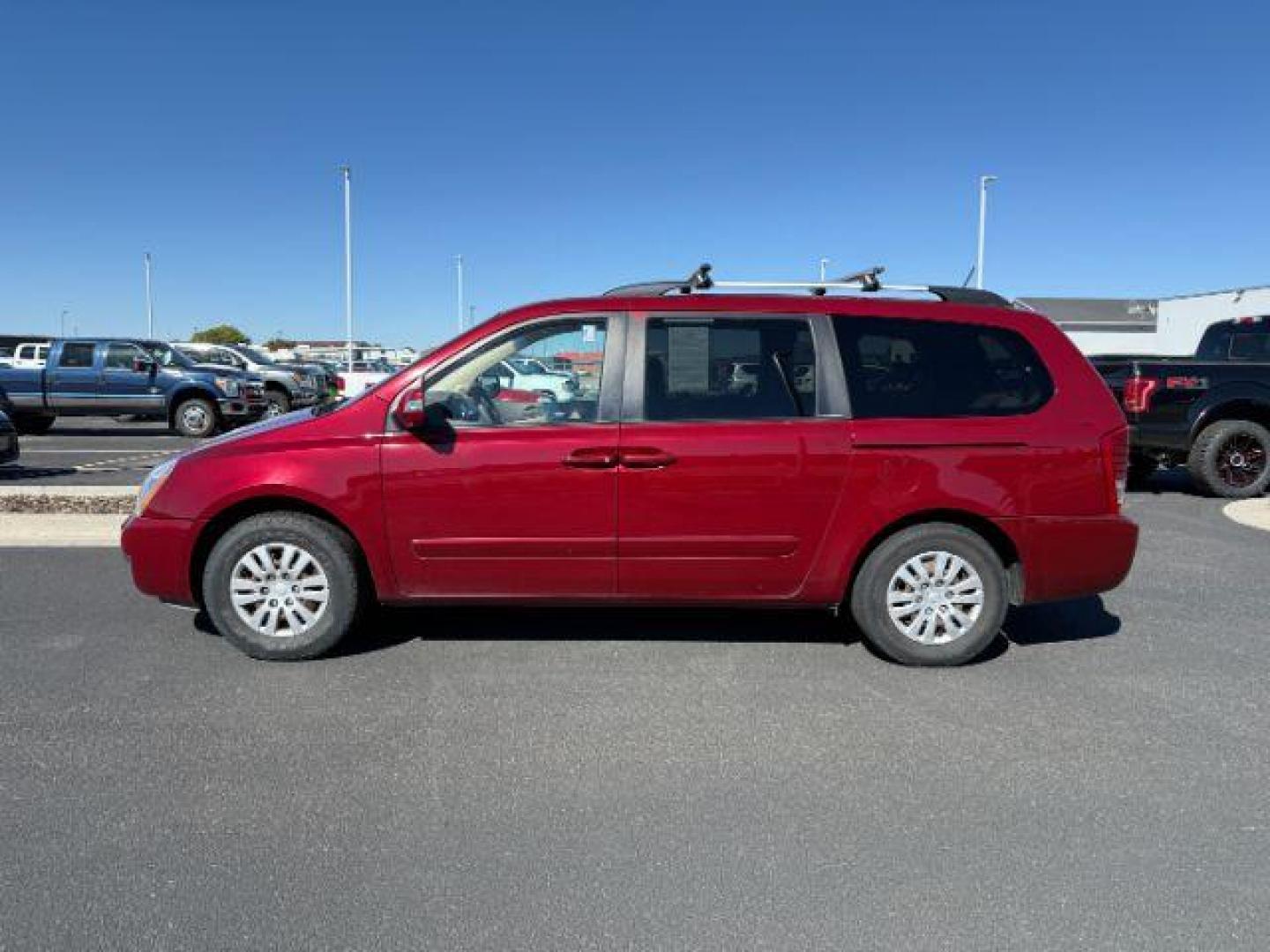 2014 Claret Red /Gray KIA Sedona (KNDMG4C7XE6) with an 35L V-6 DOHC engine, Automatic transmission, located at 1175 N Woodruff Ave, Idaho Falls, ID, 83401, 43.506901, -111.999657 - At Timberline Auto, finding a great deal on your next vehicle is always easy! Our experienced sales staff's goal is to help find you the right vehicle at the right price! Our knowledgeable finance department has options for almost any credit score. We offer extended service contract options to prote - Photo#1