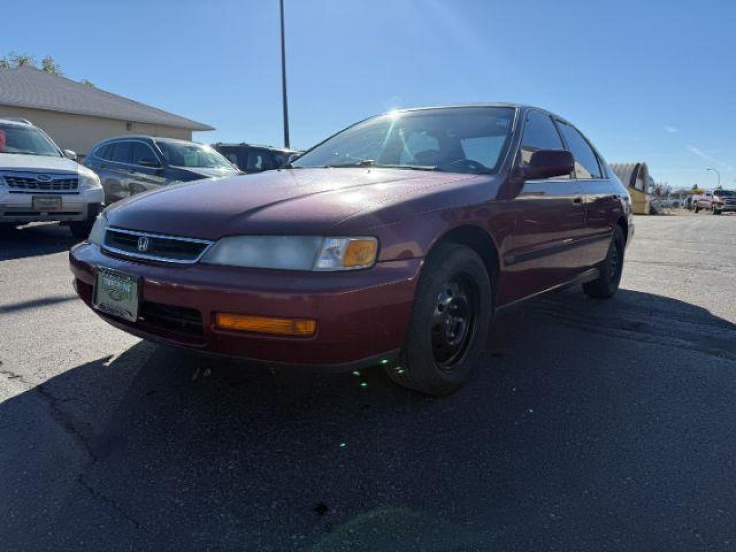 1997 MAROON /Gray Honda Accord (1HGCD5531VA) with an 22L I-4 regular unleaded engine, Manual transmission, located at 1175 N Woodruff Ave, Idaho Falls, ID, 83401, 43.506901, -111.999657 - At Timberline Auto, finding a great deal on your next vehicle is always easy! Our experienced sales staff's goal is to help find you the right vehicle at the right price! Our knowledgeable finance department has options for almost any credit score. We offer extended service contract options to prote - Photo#20