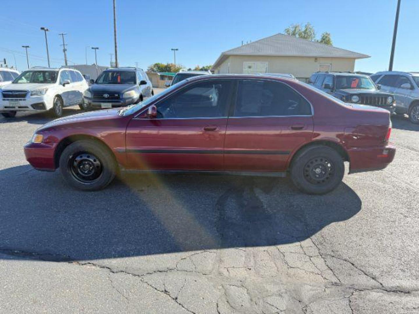 1997 MAROON /Gray Honda Accord (1HGCD5531VA) with an 22L I-4 regular unleaded engine, Manual transmission, located at 1175 N Woodruff Ave, Idaho Falls, ID, 83401, 43.506901, -111.999657 - At Timberline Auto, finding a great deal on your next vehicle is always easy! Our experienced sales staff's goal is to help find you the right vehicle at the right price! Our knowledgeable finance department has options for almost any credit score. We offer extended service contract options to prote - Photo#21