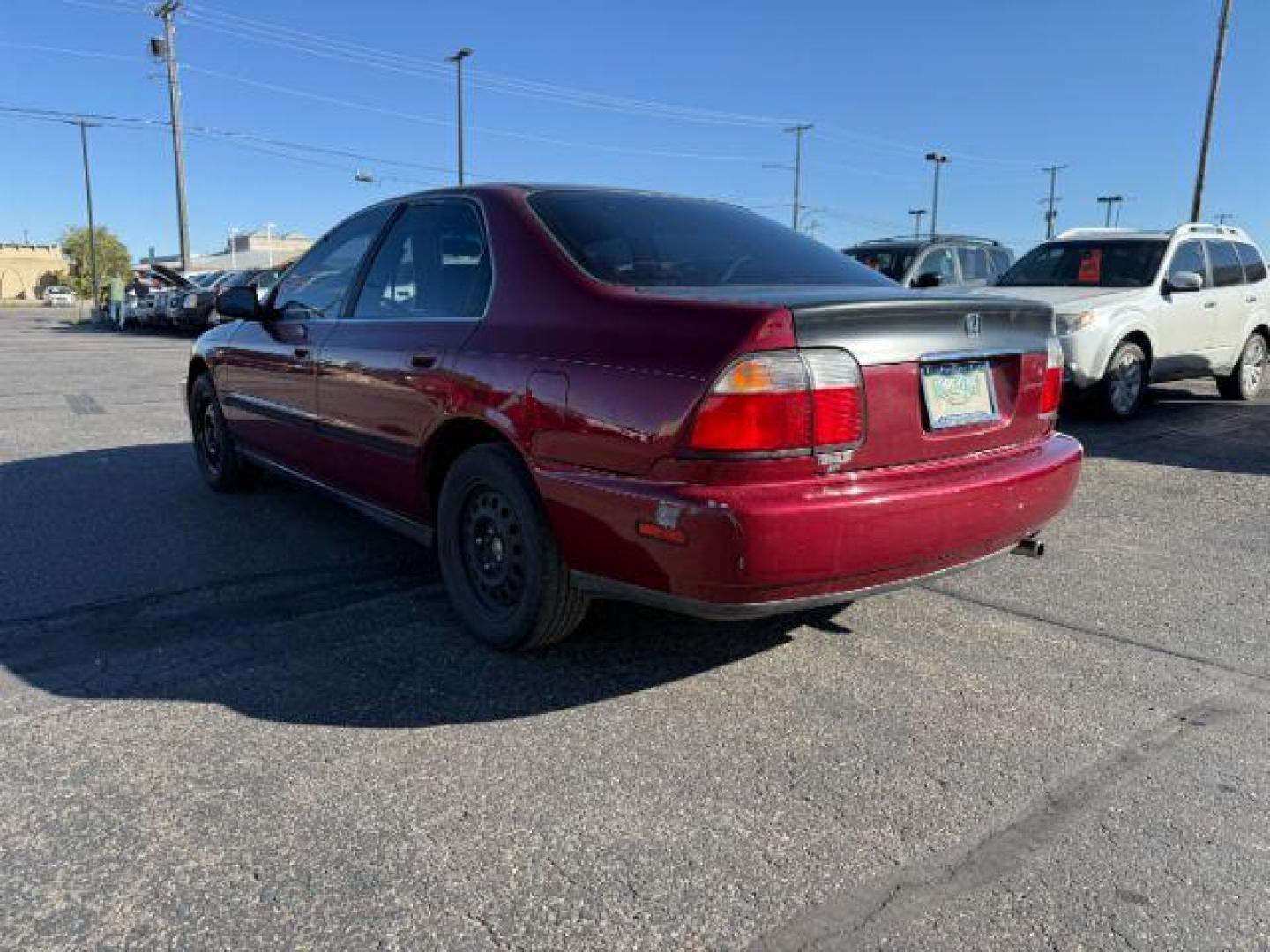 1997 MAROON /Gray Honda Accord (1HGCD5531VA) with an 22L I-4 regular unleaded engine, Manual transmission, located at 1175 N Woodruff Ave, Idaho Falls, ID, 83401, 43.506901, -111.999657 - At Timberline Auto, finding a great deal on your next vehicle is always easy! Our experienced sales staff's goal is to help find you the right vehicle at the right price! Our knowledgeable finance department has options for almost any credit score. We offer extended service contract options to prote - Photo#22