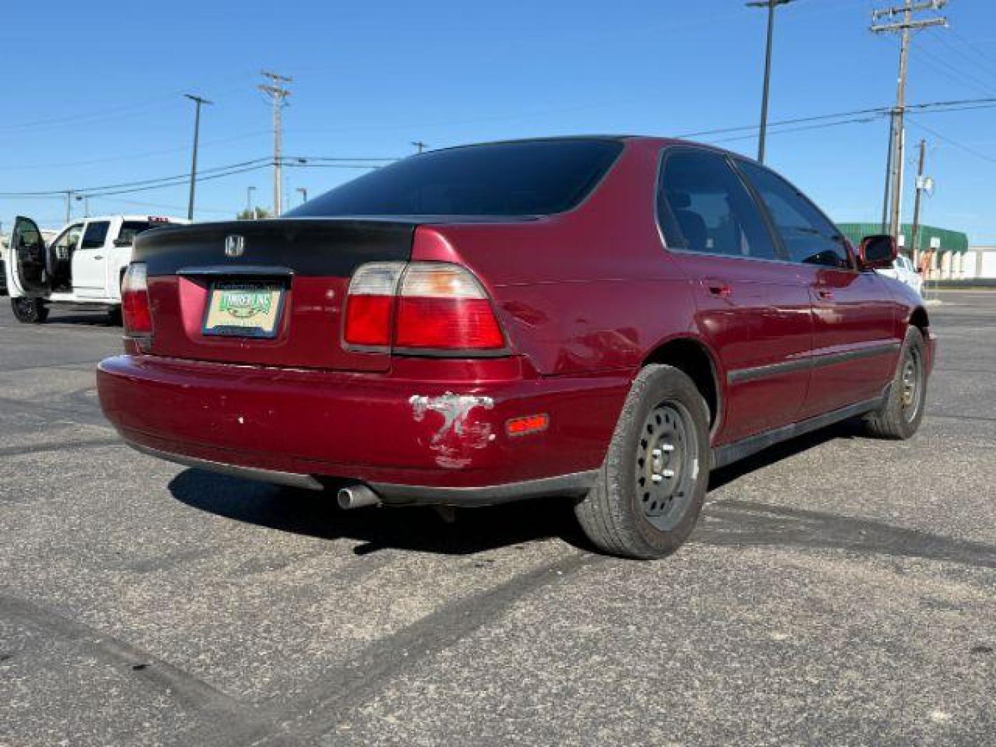 1997 MAROON /Gray Honda Accord (1HGCD5531VA) with an 22L I-4 regular unleaded engine, Manual transmission, located at 1175 N Woodruff Ave, Idaho Falls, ID, 83401, 43.506901, -111.999657 - At Timberline Auto, finding a great deal on your next vehicle is always easy! Our experienced sales staff's goal is to help find you the right vehicle at the right price! Our knowledgeable finance department has options for almost any credit score. We offer extended service contract options to prote - Photo#24