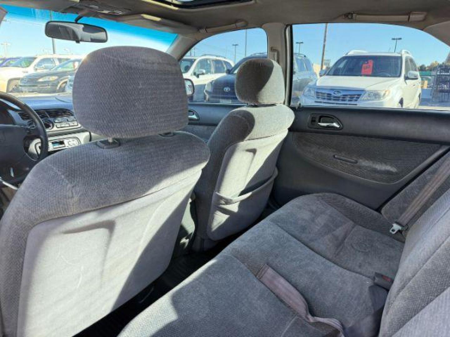 1997 MAROON /Gray Honda Accord (1HGCD5531VA) with an 22L I-4 regular unleaded engine, Manual transmission, located at 1175 N Woodruff Ave, Idaho Falls, ID, 83401, 43.506901, -111.999657 - At Timberline Auto, finding a great deal on your next vehicle is always easy! Our experienced sales staff's goal is to help find you the right vehicle at the right price! Our knowledgeable finance department has options for almost any credit score. We offer extended service contract options to prote - Photo#38