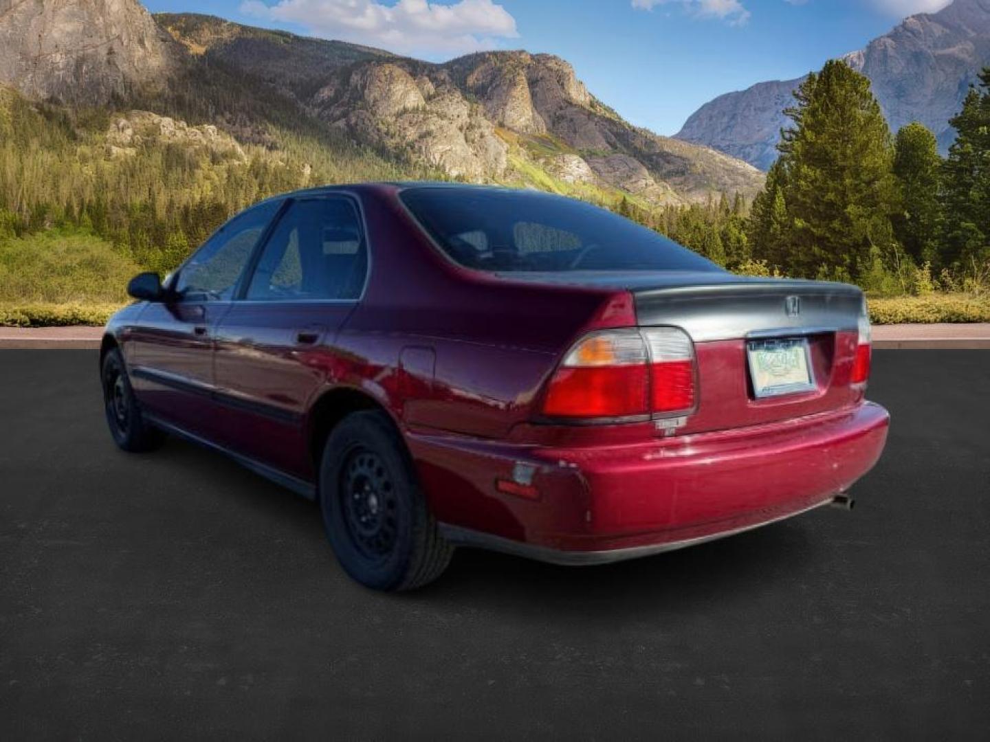 1997 MAROON /Gray Honda Accord (1HGCD5531VA) with an 22L I-4 regular unleaded engine, Manual transmission, located at 1175 N Woodruff Ave, Idaho Falls, ID, 83401, 43.506901, -111.999657 - At Timberline Auto, finding a great deal on your next vehicle is always easy! Our experienced sales staff's goal is to help find you the right vehicle at the right price! Our knowledgeable finance department has options for almost any credit score. We offer extended service contract options to prote - Photo#2