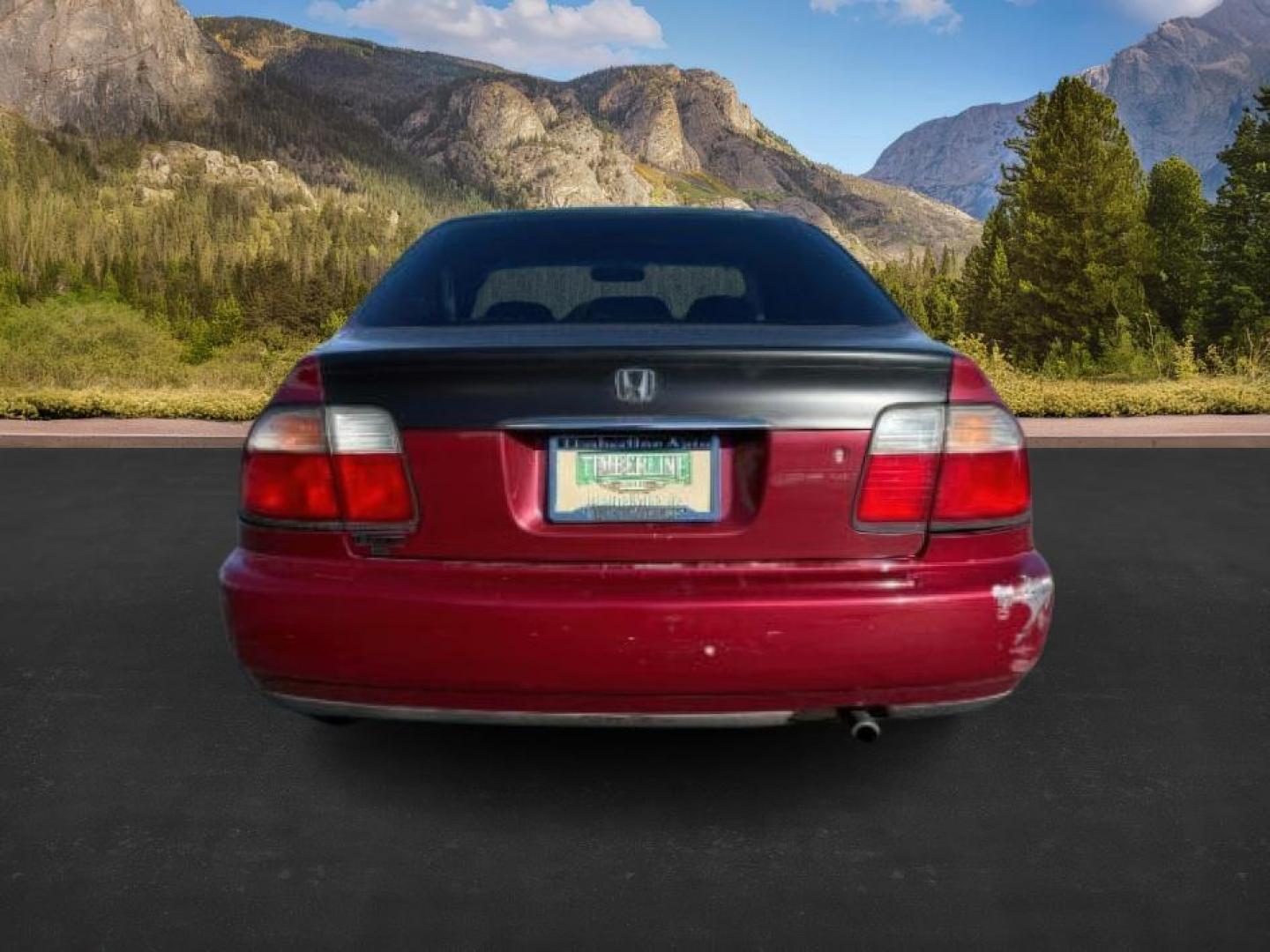 1997 MAROON /Gray Honda Accord (1HGCD5531VA) with an 22L I-4 regular unleaded engine, Manual transmission, located at 1175 N Woodruff Ave, Idaho Falls, ID, 83401, 43.506901, -111.999657 - At Timberline Auto, finding a great deal on your next vehicle is always easy! Our experienced sales staff's goal is to help find you the right vehicle at the right price! Our knowledgeable finance department has options for almost any credit score. We offer extended service contract options to prote - Photo#3