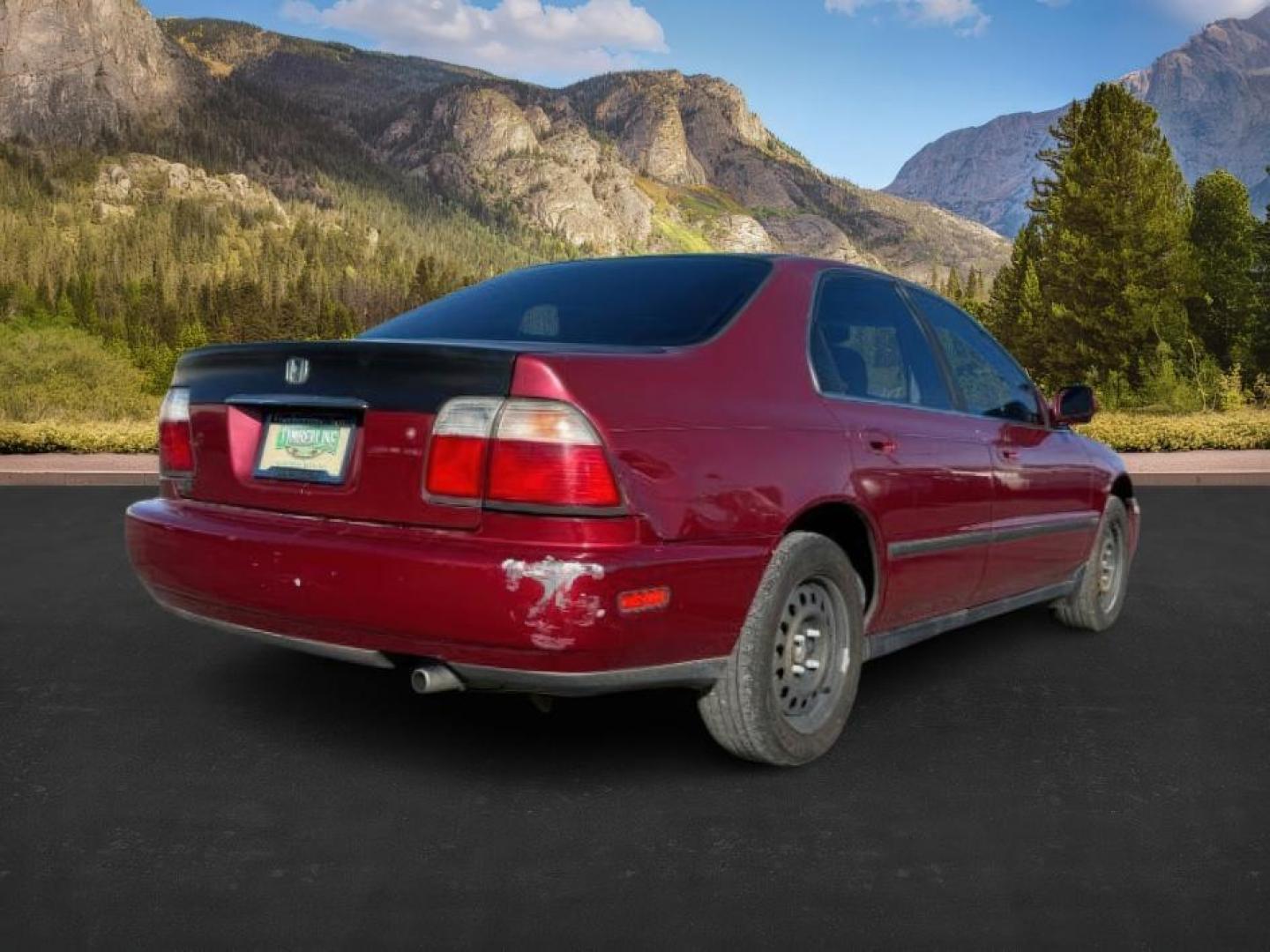 1997 MAROON /Gray Honda Accord (1HGCD5531VA) with an 22L I-4 regular unleaded engine, Manual transmission, located at 1175 N Woodruff Ave, Idaho Falls, ID, 83401, 43.506901, -111.999657 - At Timberline Auto, finding a great deal on your next vehicle is always easy! Our experienced sales staff's goal is to help find you the right vehicle at the right price! Our knowledgeable finance department has options for almost any credit score. We offer extended service contract options to prote - Photo#4