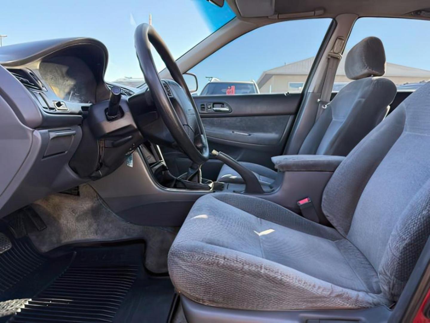 1997 MAROON /Gray Honda Accord (1HGCD5531VA) with an 22L I-4 regular unleaded engine, Manual transmission, located at 1175 N Woodruff Ave, Idaho Falls, ID, 83401, 43.506901, -111.999657 - At Timberline Auto, finding a great deal on your next vehicle is always easy! Our experienced sales staff's goal is to help find you the right vehicle at the right price! Our knowledgeable finance department has options for almost any credit score. We offer extended service contract options to prote - Photo#10