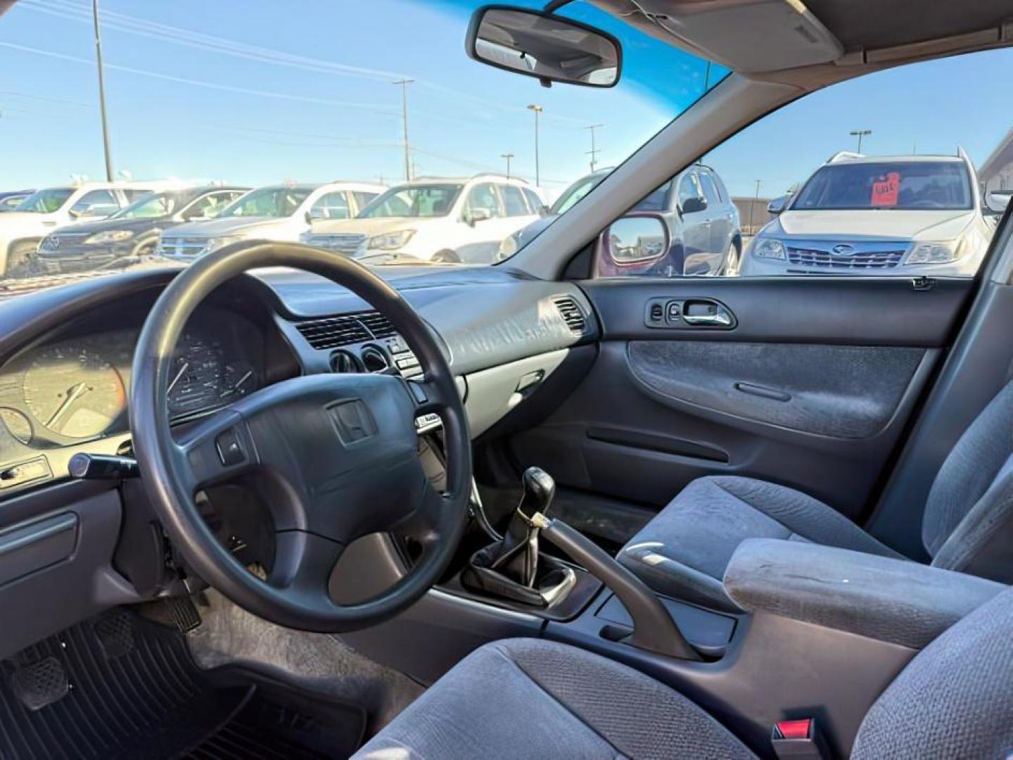 1997 MAROON /Gray Honda Accord (1HGCD5531VA) with an 22L I-4 regular unleaded engine, Manual transmission, located at 1175 N Woodruff Ave, Idaho Falls, ID, 83401, 43.506901, -111.999657 - At Timberline Auto, finding a great deal on your next vehicle is always easy! Our experienced sales staff's goal is to help find you the right vehicle at the right price! Our knowledgeable finance department has options for almost any credit score. We offer extended service contract options to prote - Photo#11