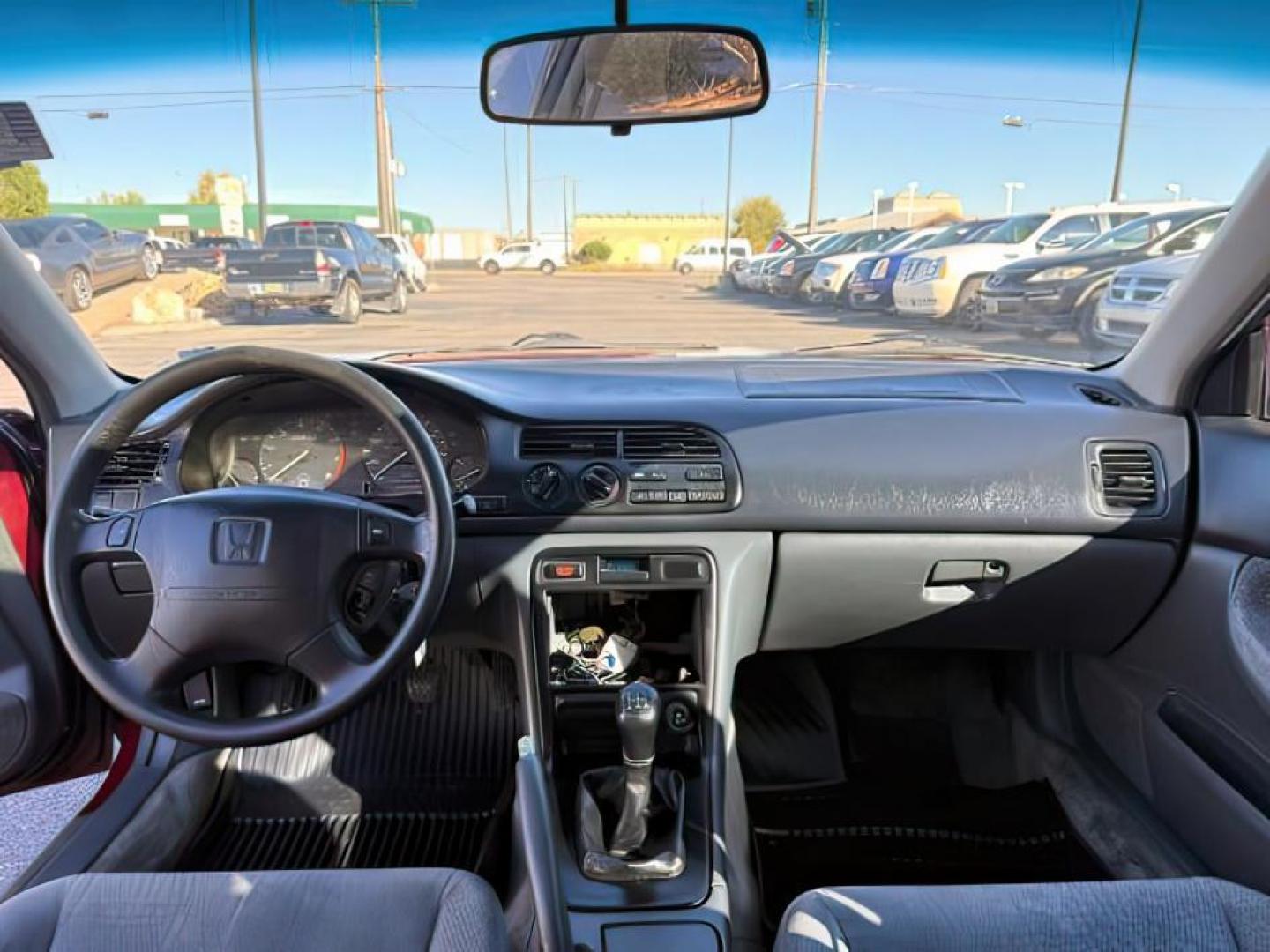 1997 MAROON /Gray Honda Accord (1HGCD5531VA) with an 22L I-4 regular unleaded engine, Manual transmission, located at 1175 N Woodruff Ave, Idaho Falls, ID, 83401, 43.506901, -111.999657 - At Timberline Auto, finding a great deal on your next vehicle is always easy! Our experienced sales staff's goal is to help find you the right vehicle at the right price! Our knowledgeable finance department has options for almost any credit score. We offer extended service contract options to prote - Photo#17